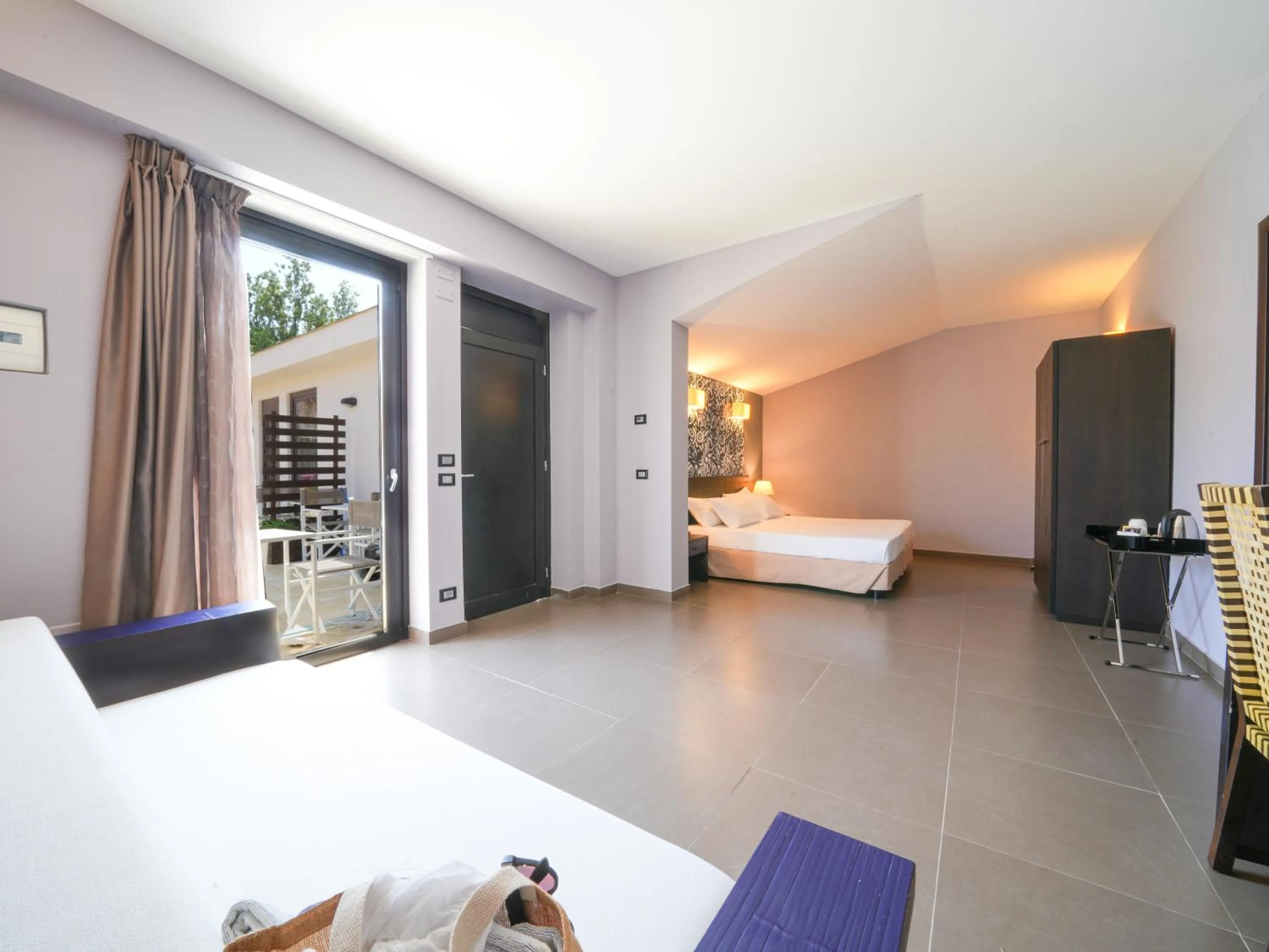 Photo of the whole room, Bed in Le Dune Resort