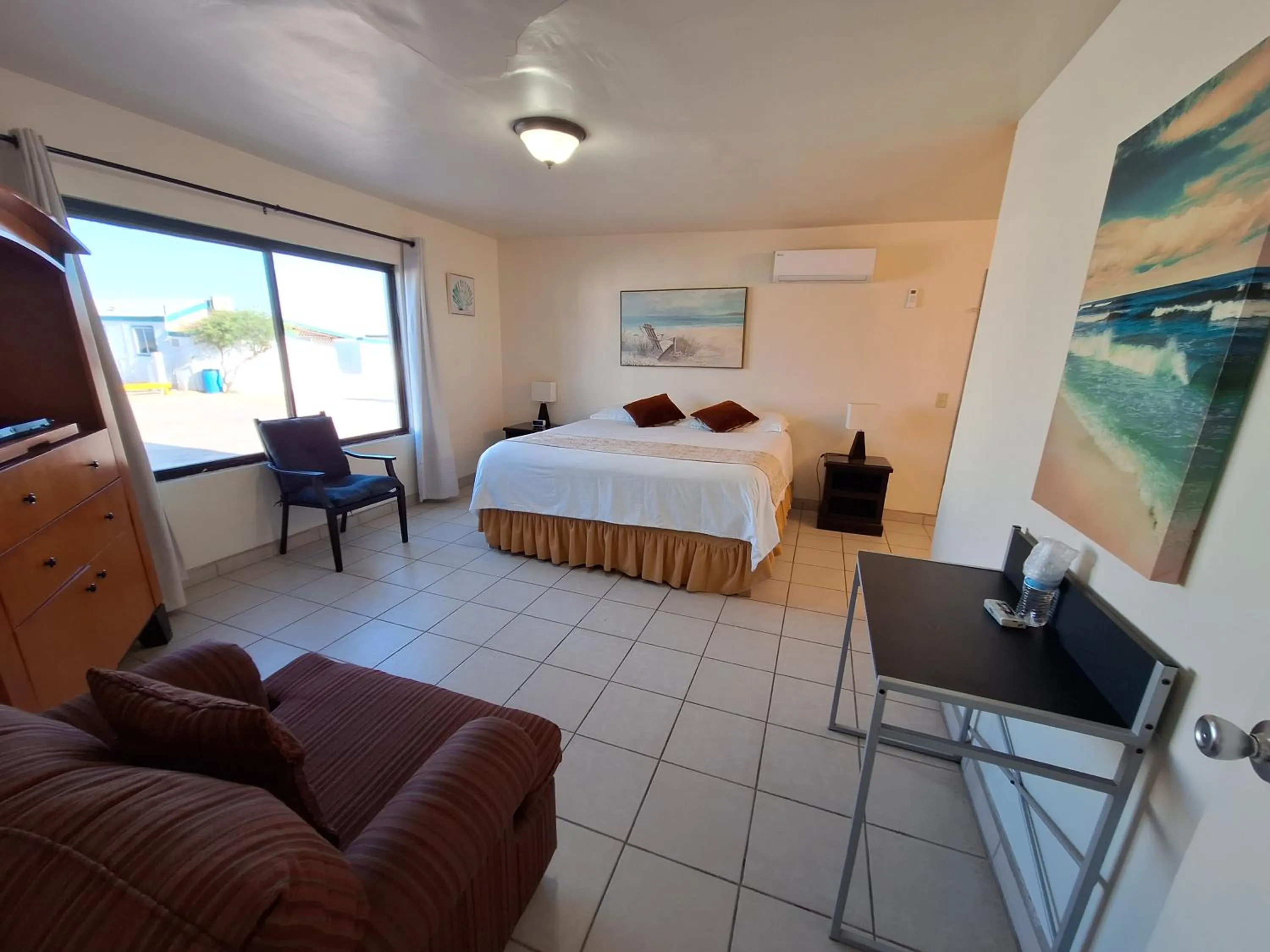 Bed in #55 Suite Bungalow Seaside Hotel & Victors RV Park