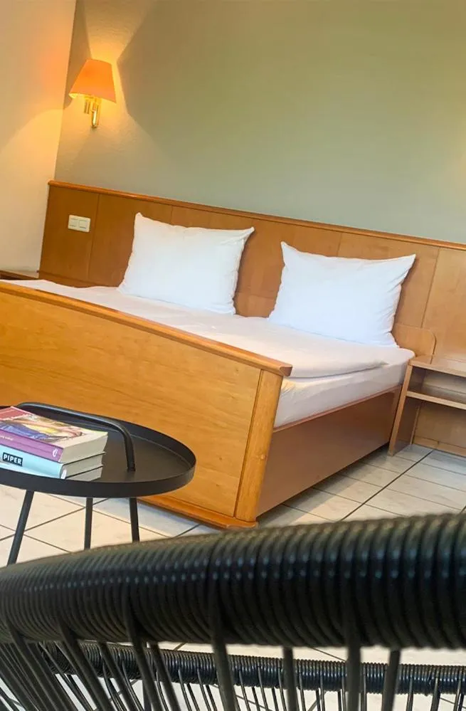 Photo of the whole room, Bed in Der Grüne Baum