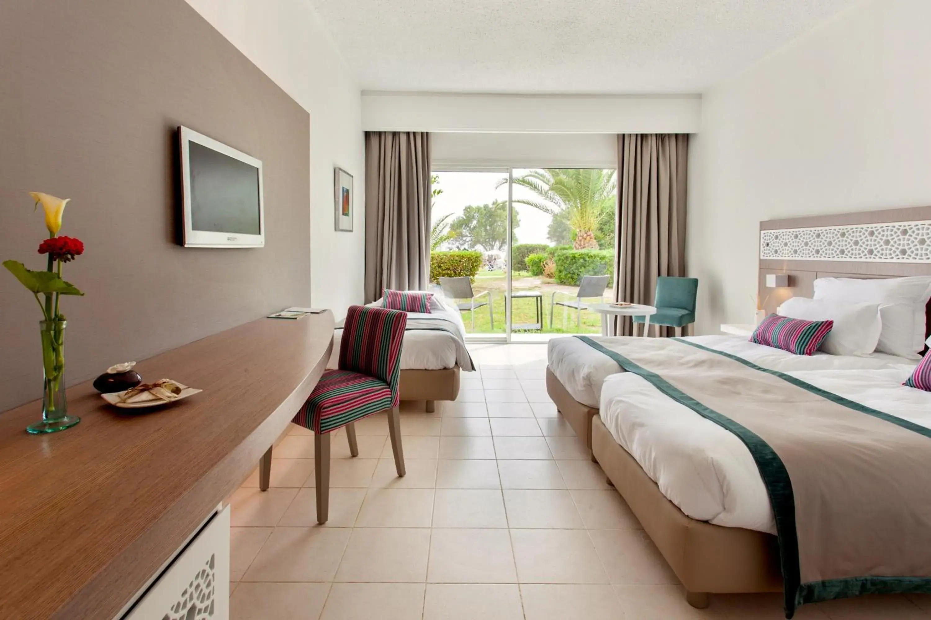 Standard Triple Room with Garden View in Le Sultan Standard Triple Room with Garden View in Le Sultan