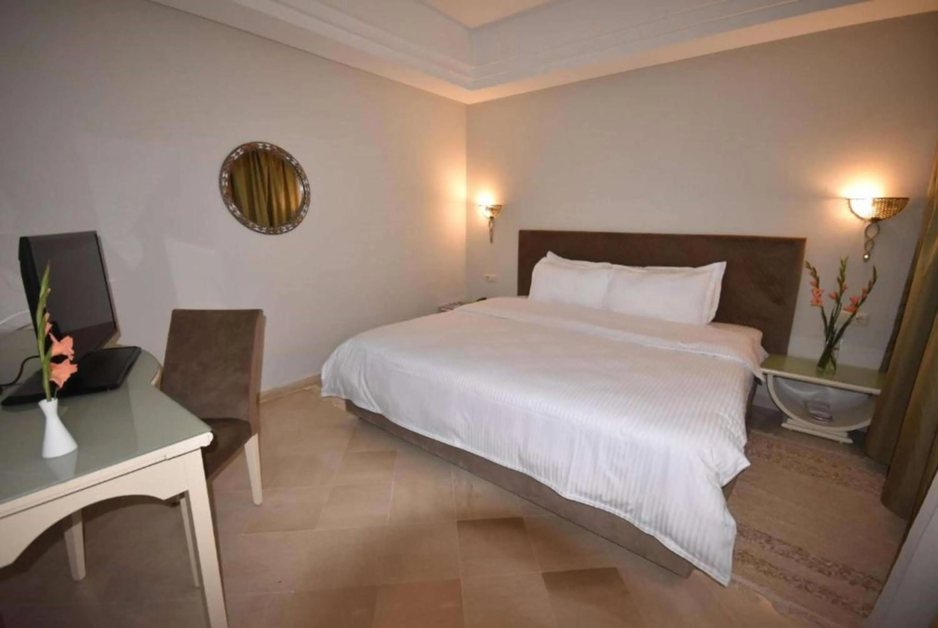 Photo of the whole room, Bed in Ramada Plaza by Wyndham Tunis