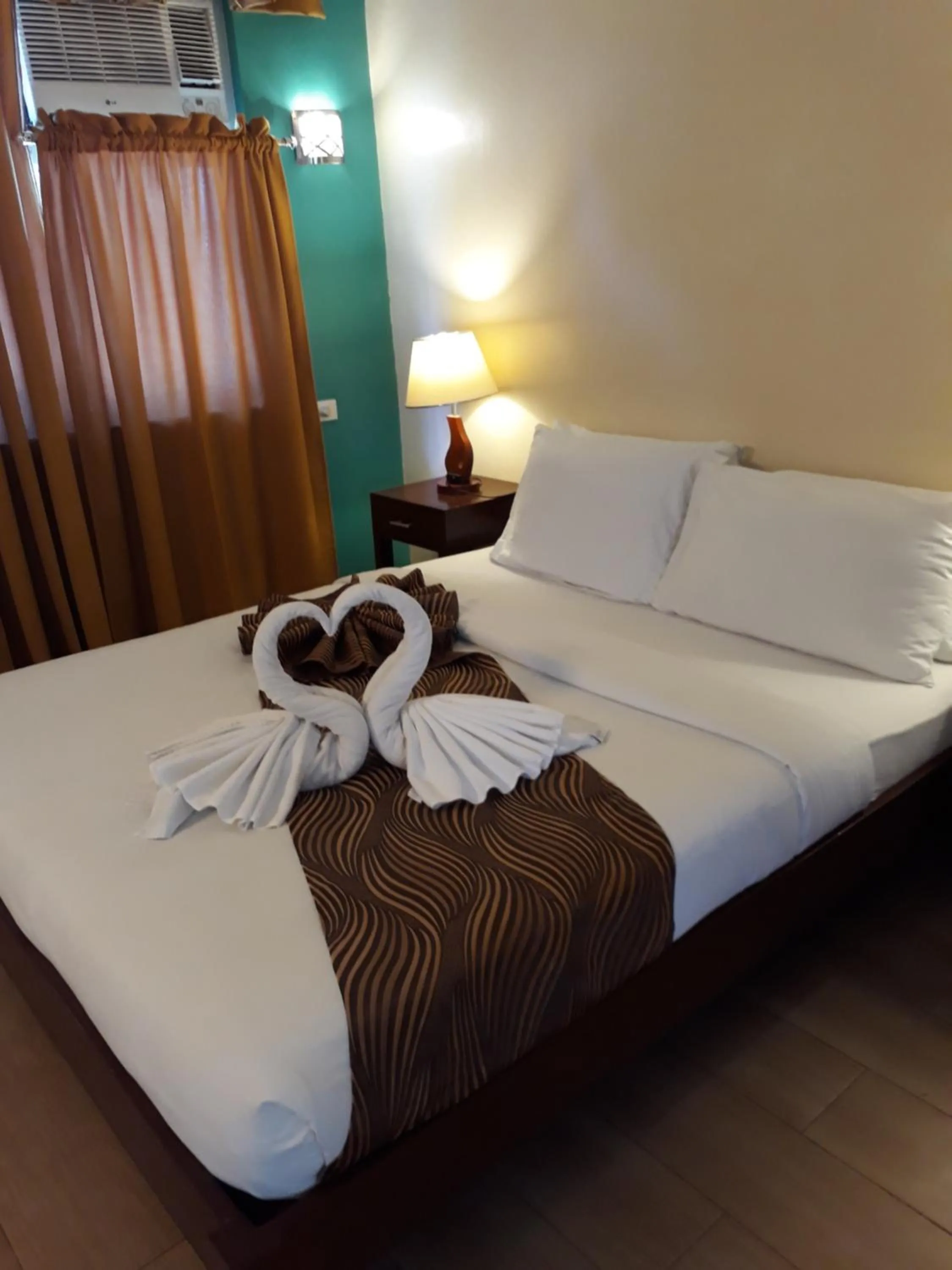 Bed in Sea Garden Resort Iloilo