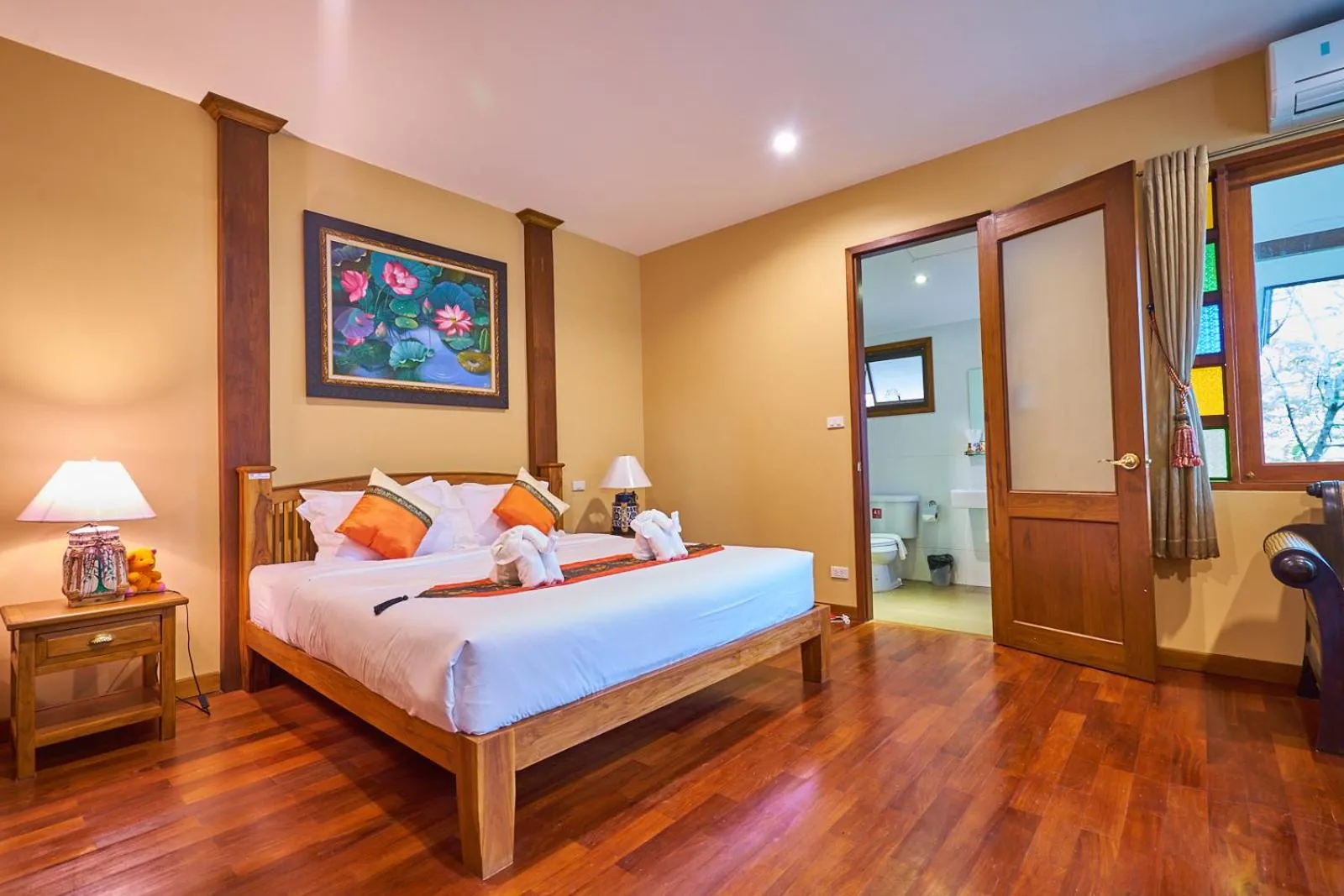 Bed in Mina Garden Villa Resort