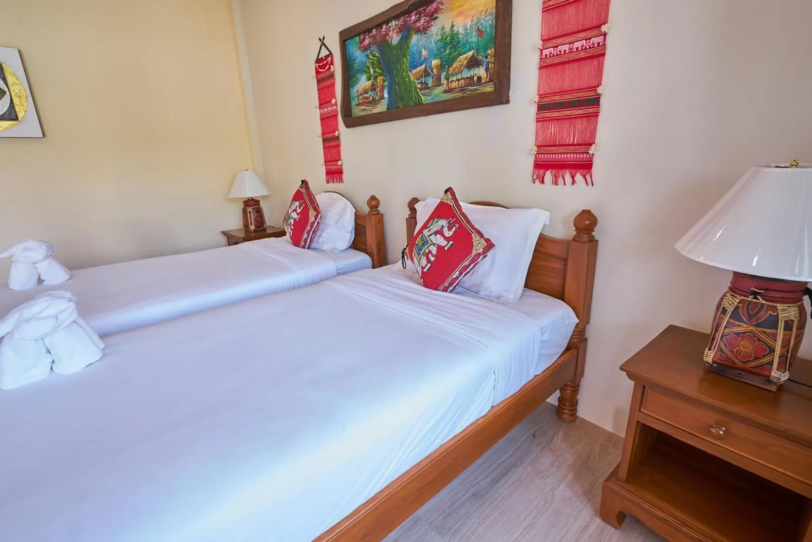 Bed in Mina Garden Villa Resort