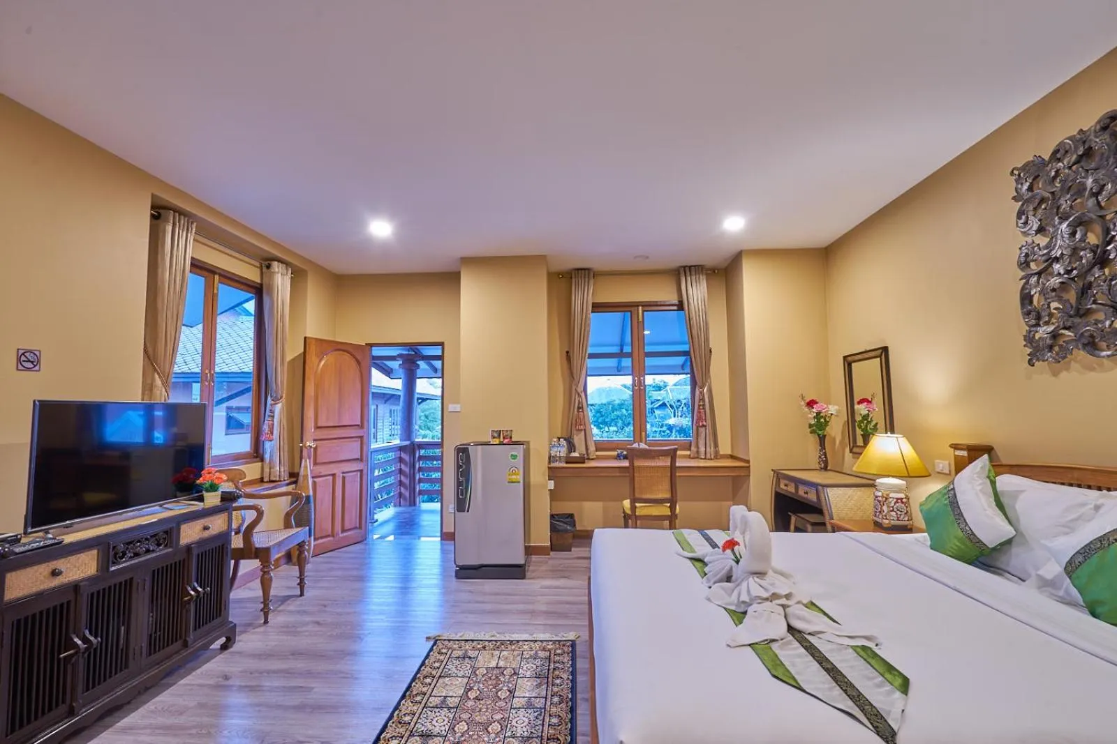 Bed in Mina Garden Villa Resort