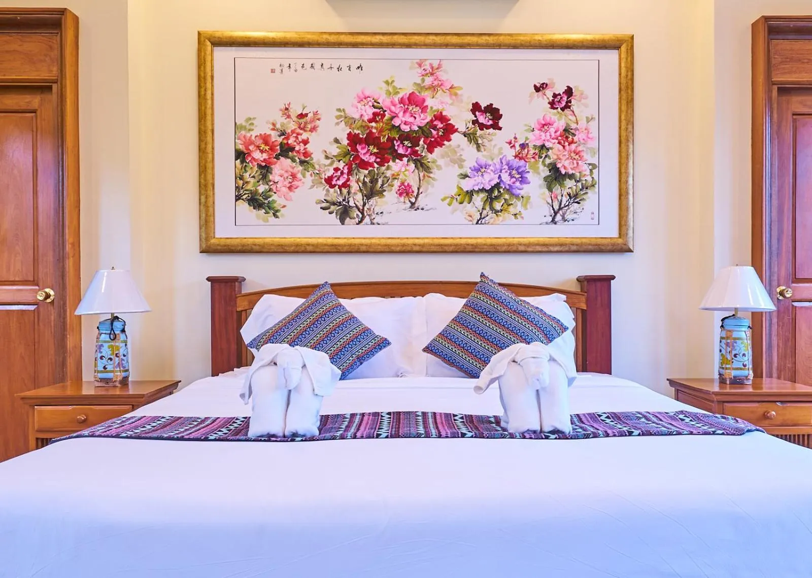 Bed in Mina Garden Villa Resort