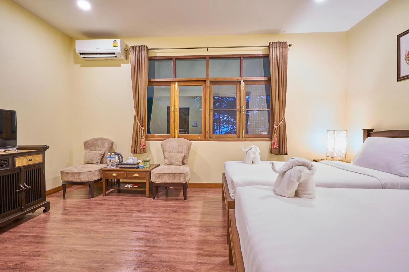 Bed in Mina Garden Villa Resort