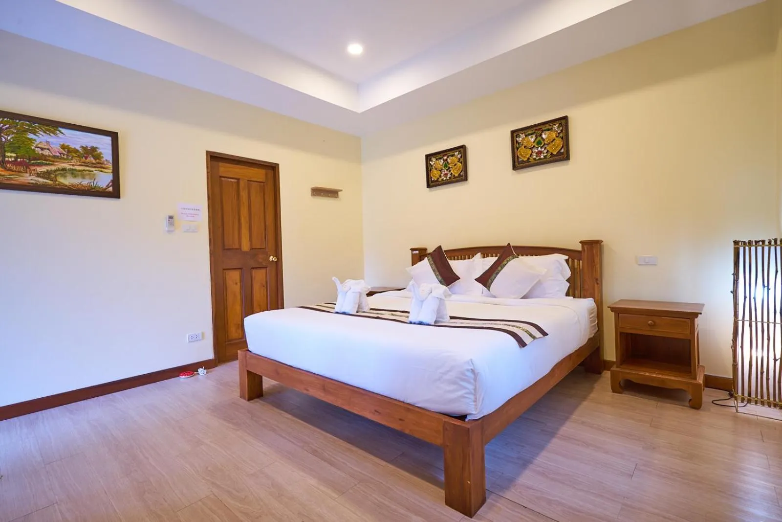 Bed in Mina Garden Villa Resort