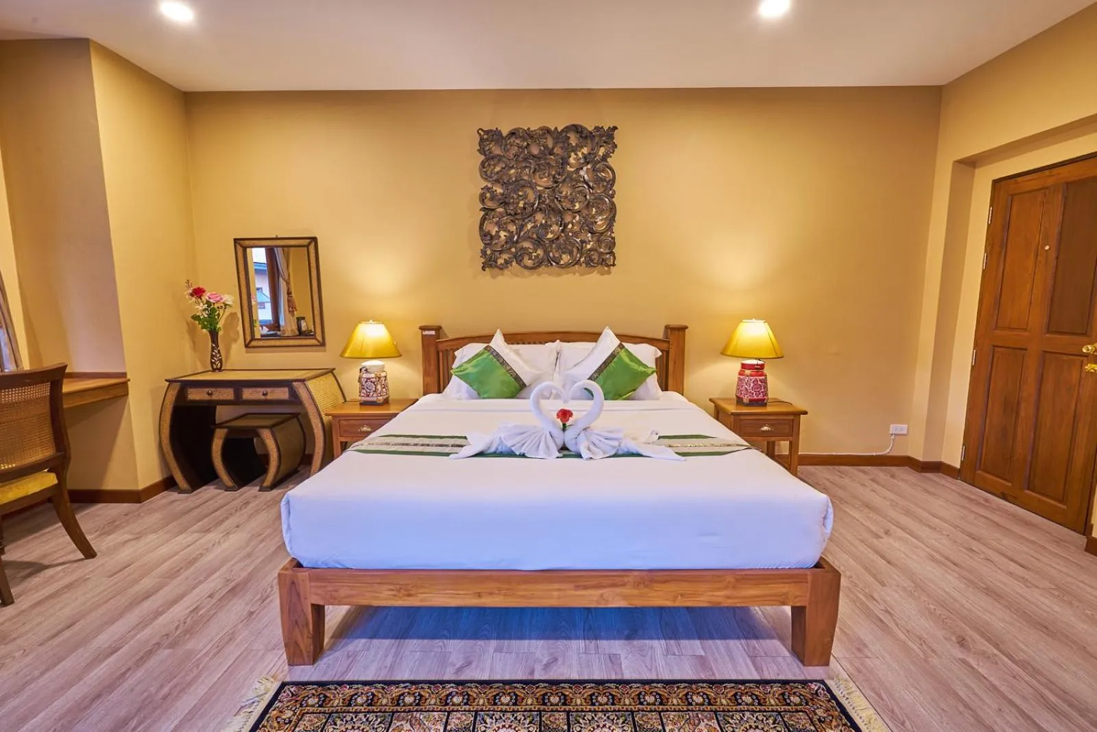 Bed in Mina Garden Villa Resort