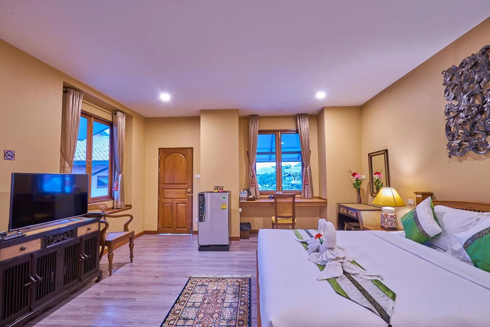 Bed in Mina Garden Villa Resort