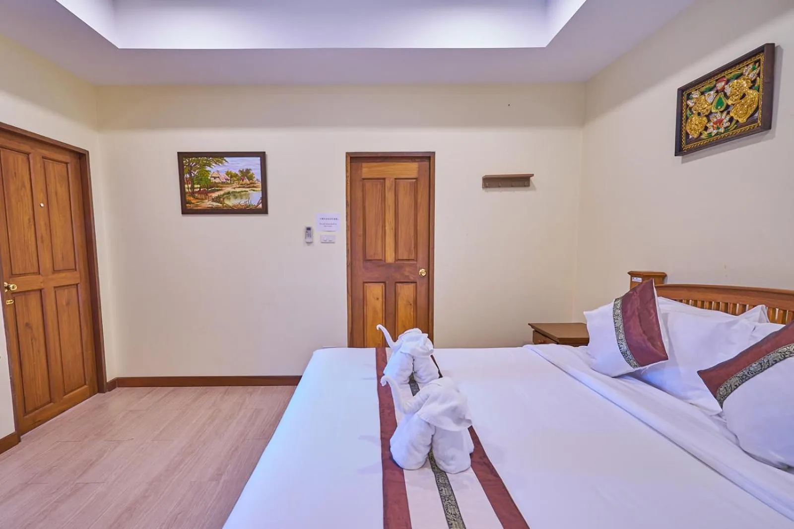 Bed in Mina Garden Villa Resort