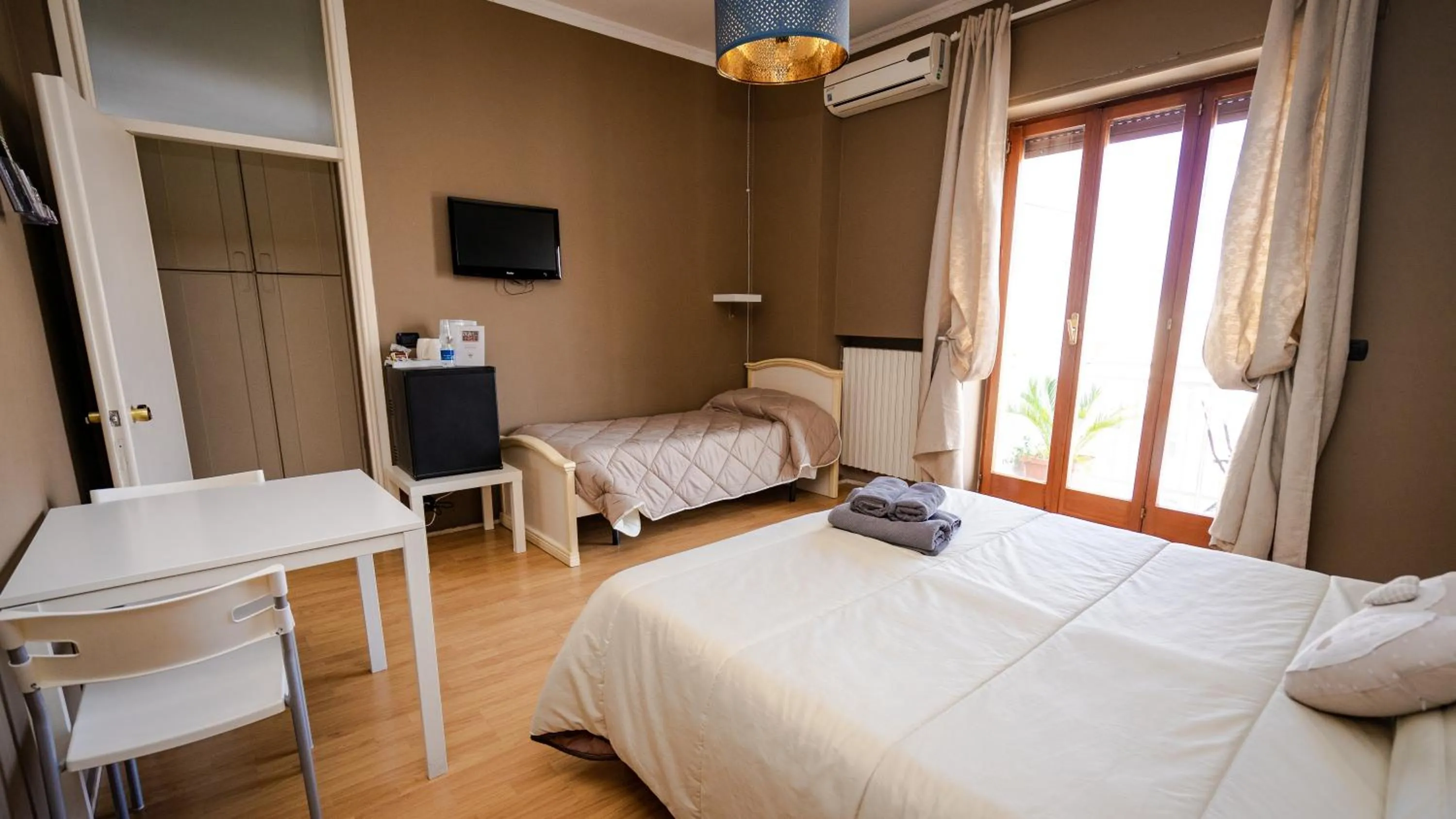 Bed in CconfortHotels R&B Dolci Emozioni