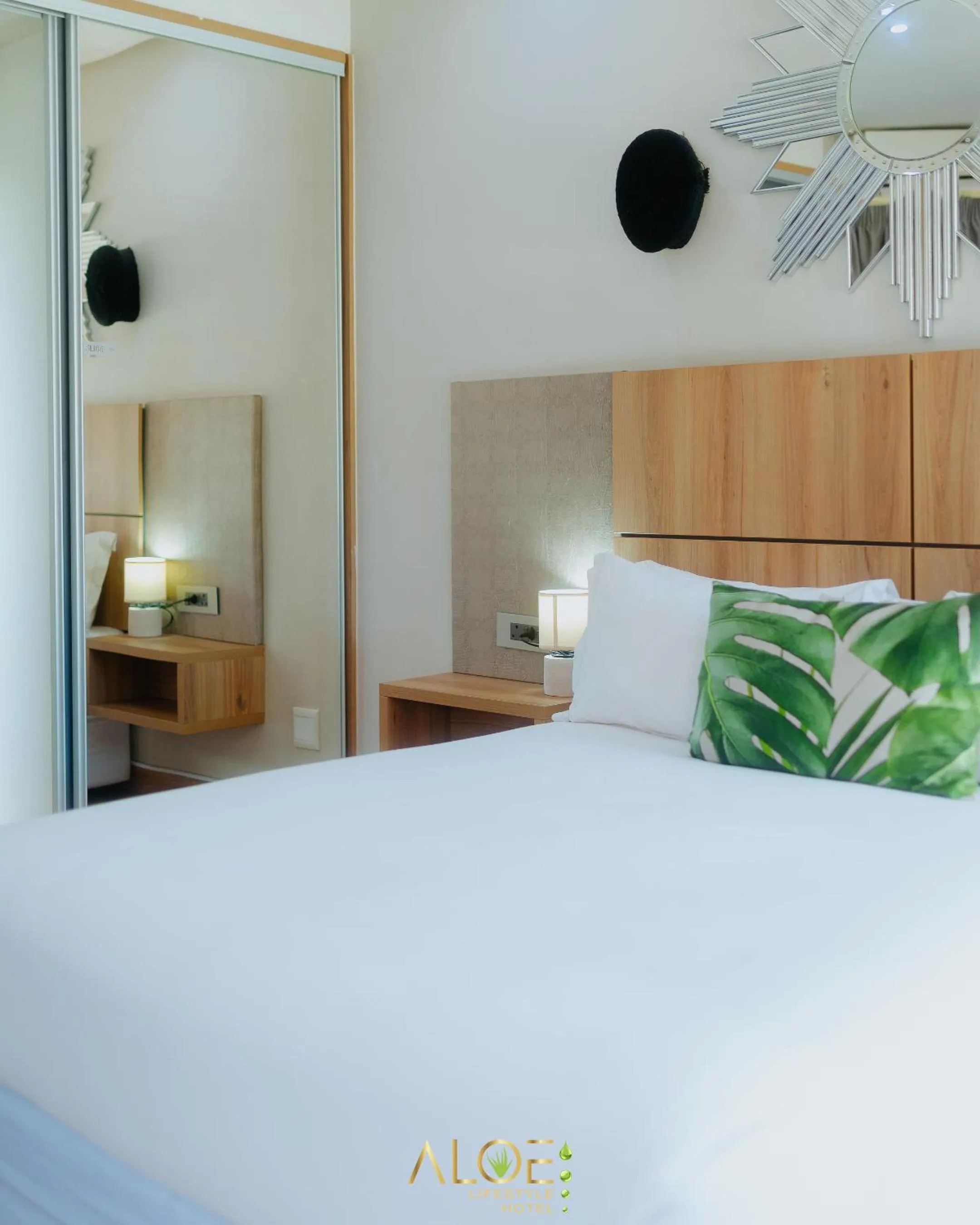 Bed in Aloe Lifestyle Hotel