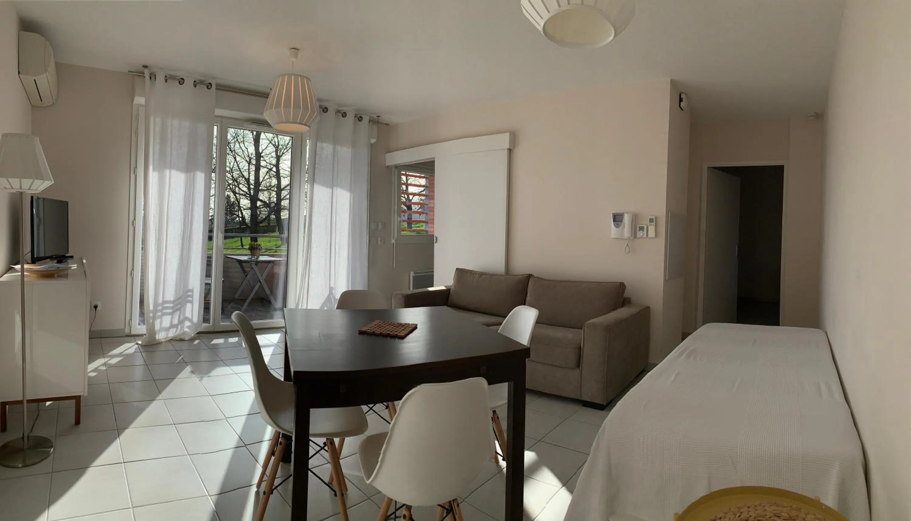 Seating area, Bed in Résidence Saint Clair