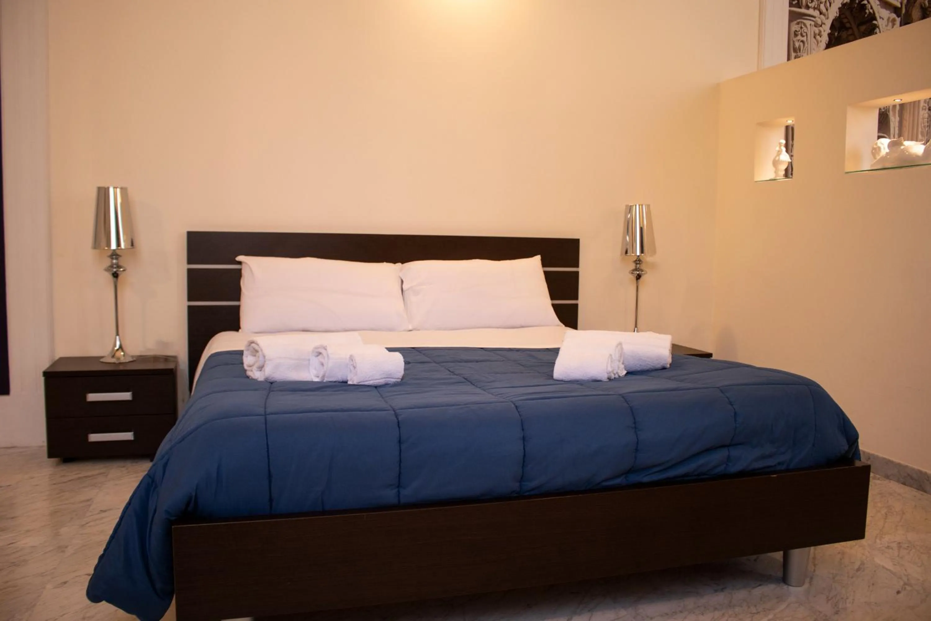 Bed in Apollo Suites