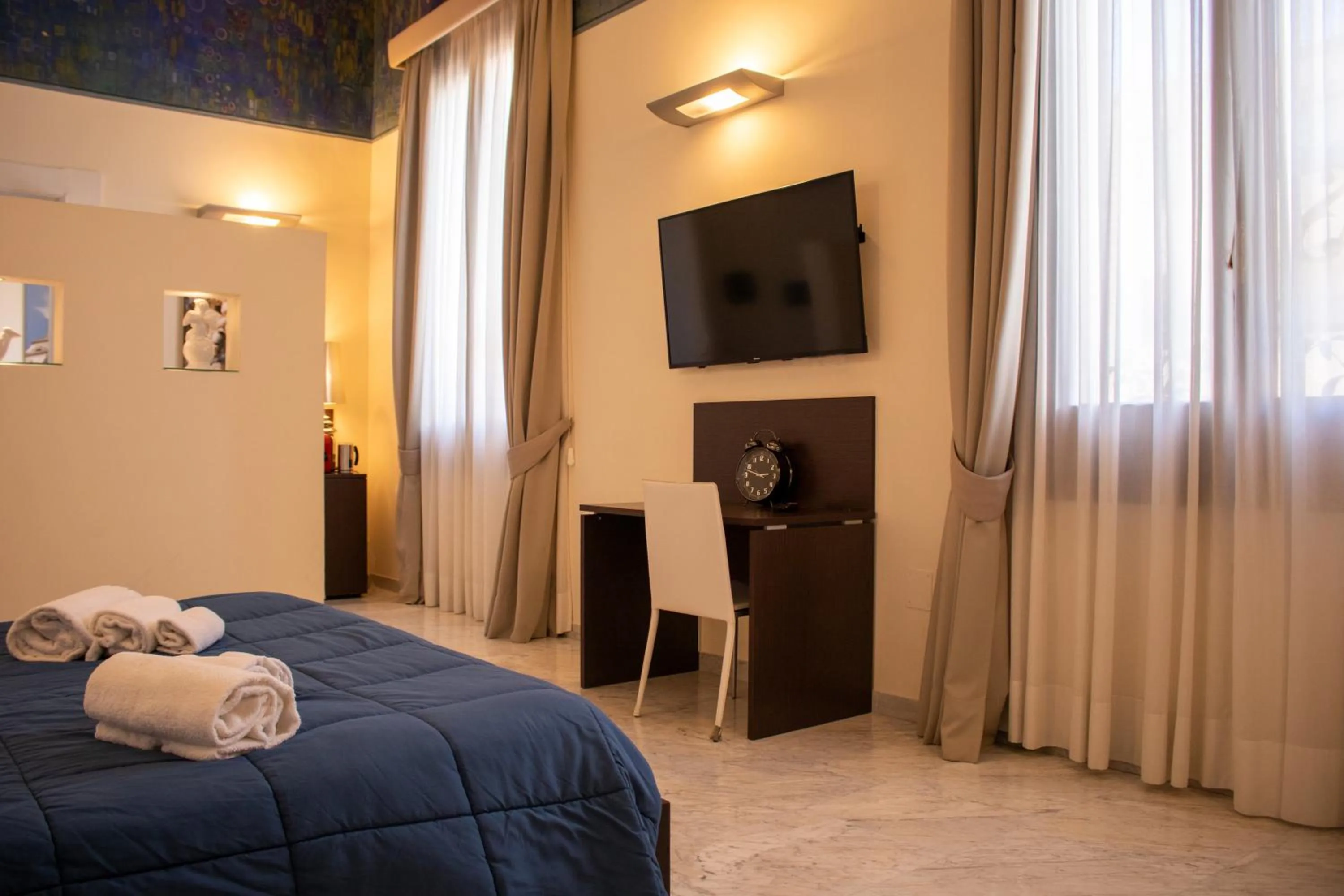 Bedroom, Bed in Apollo Suites