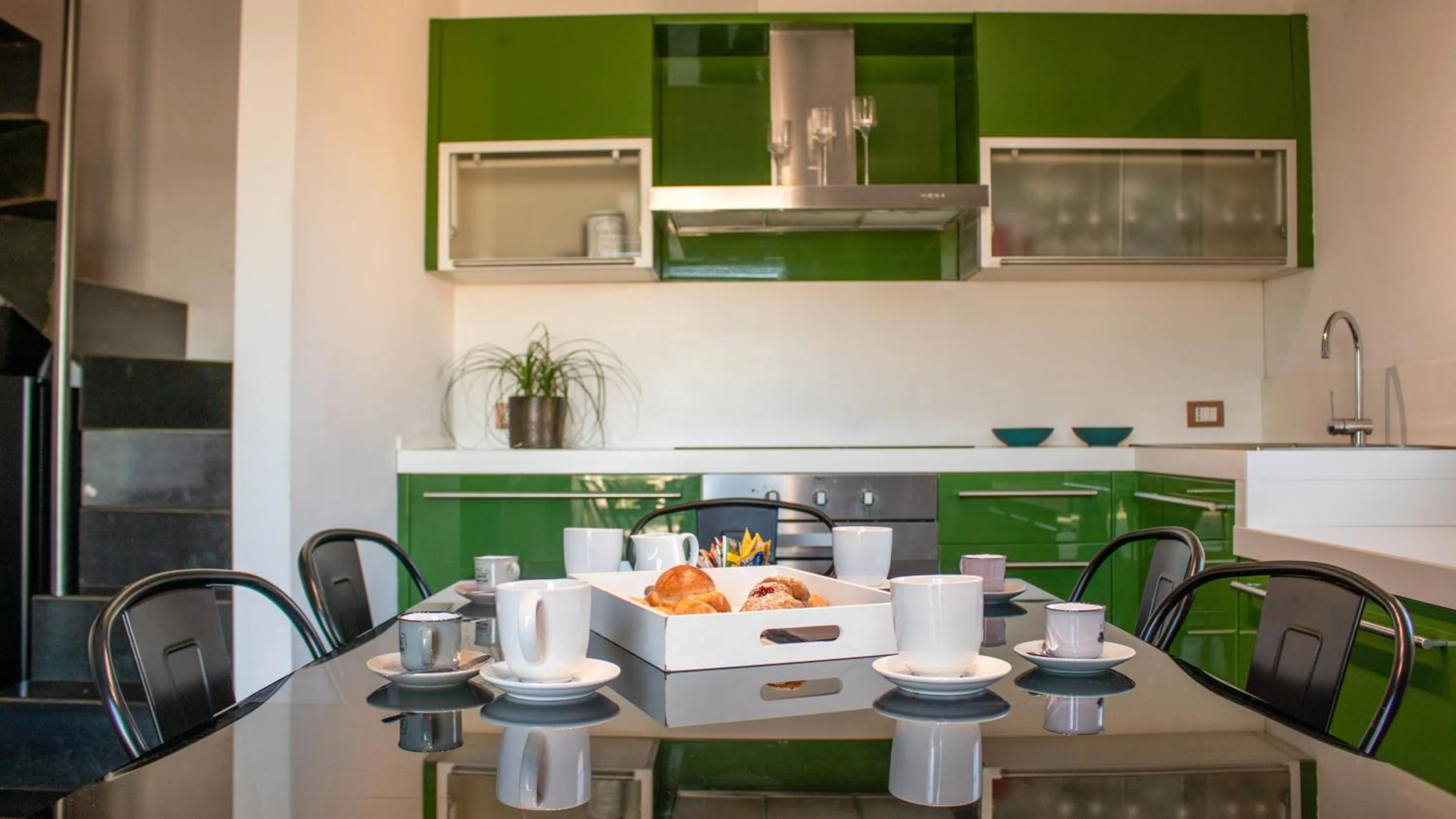 Kitchen or kitchenette in Apollo Suites