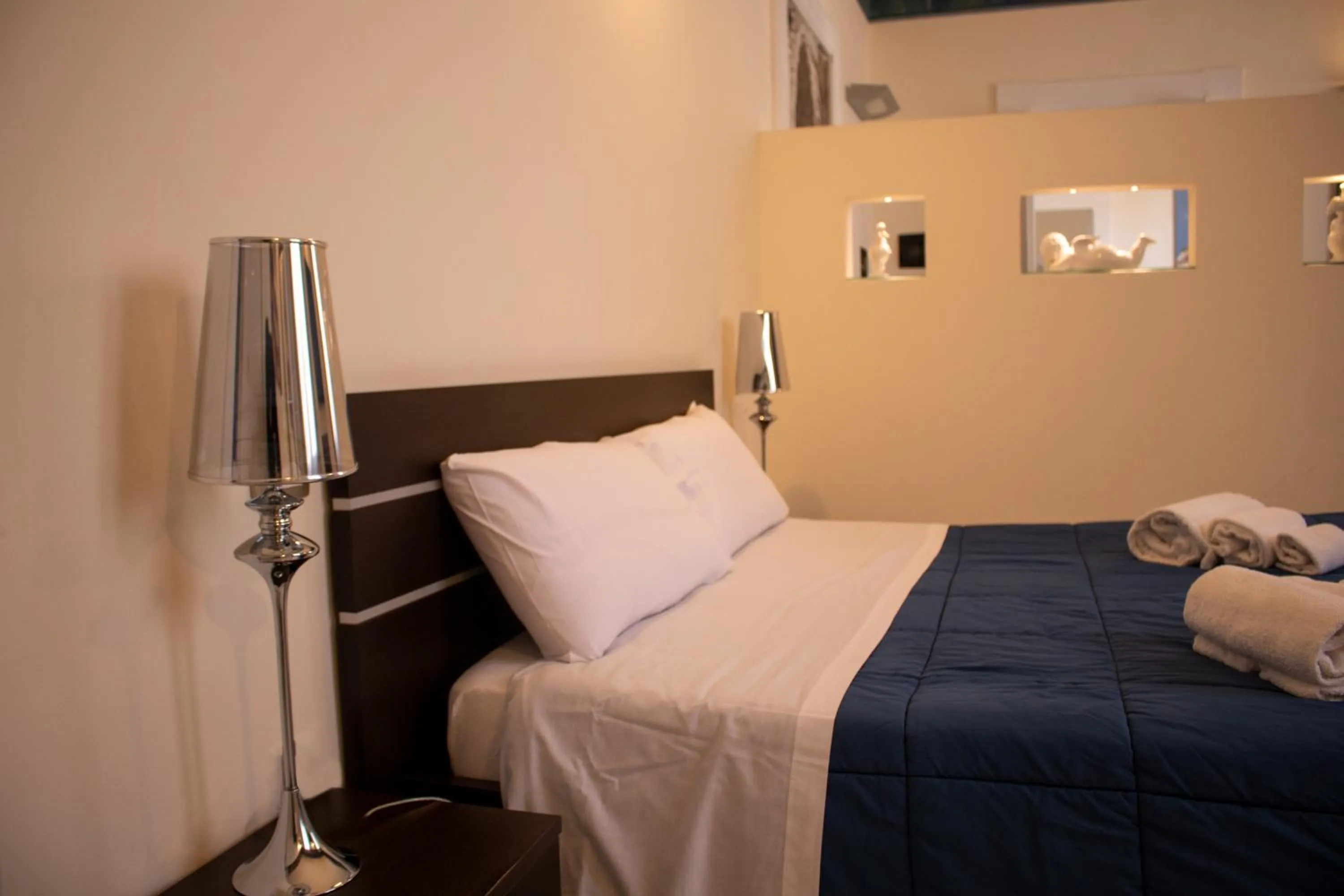 Bed in Apollo Suites