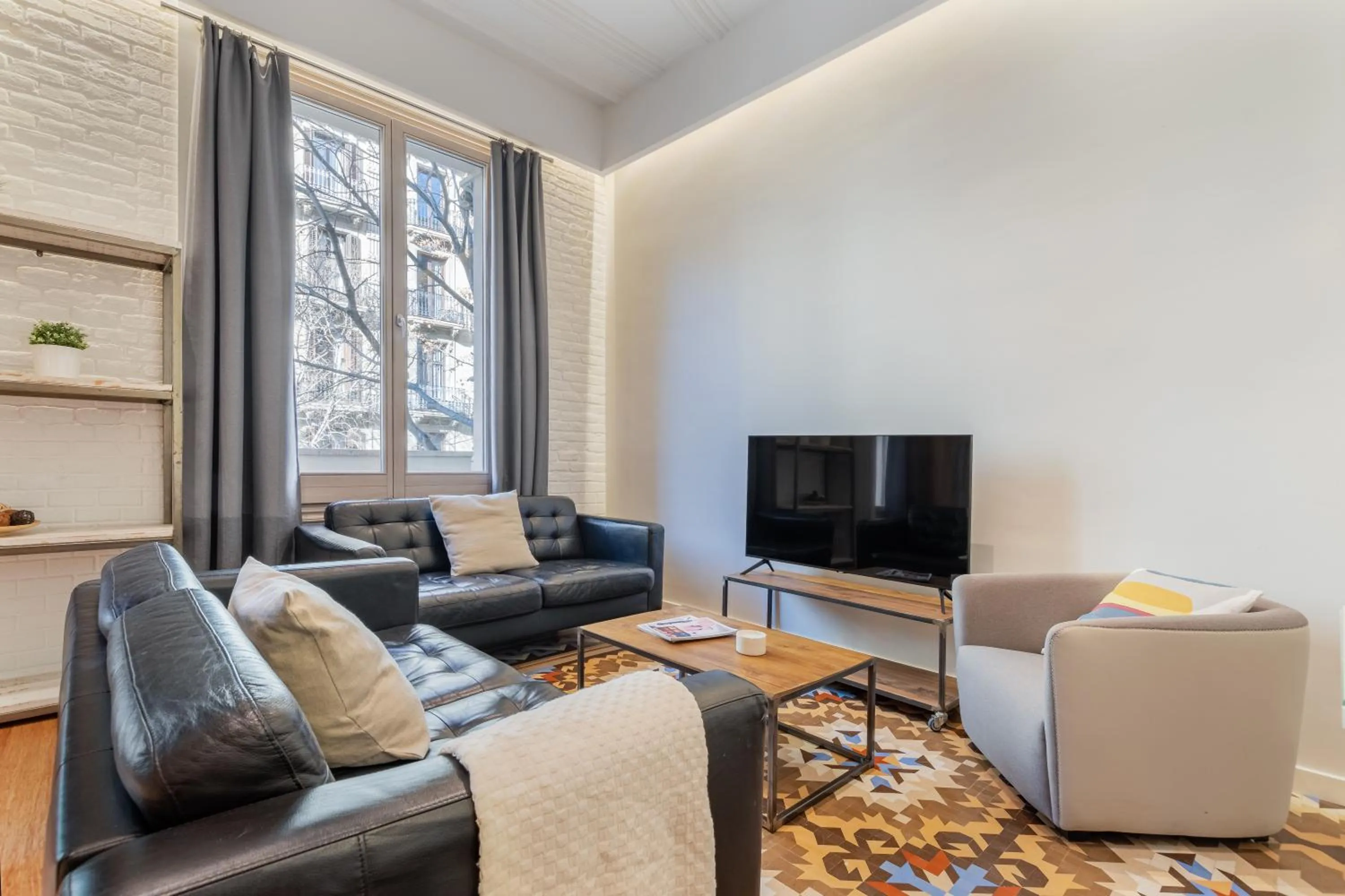 TV and multimedia in Fuster Apartments by Aspasios