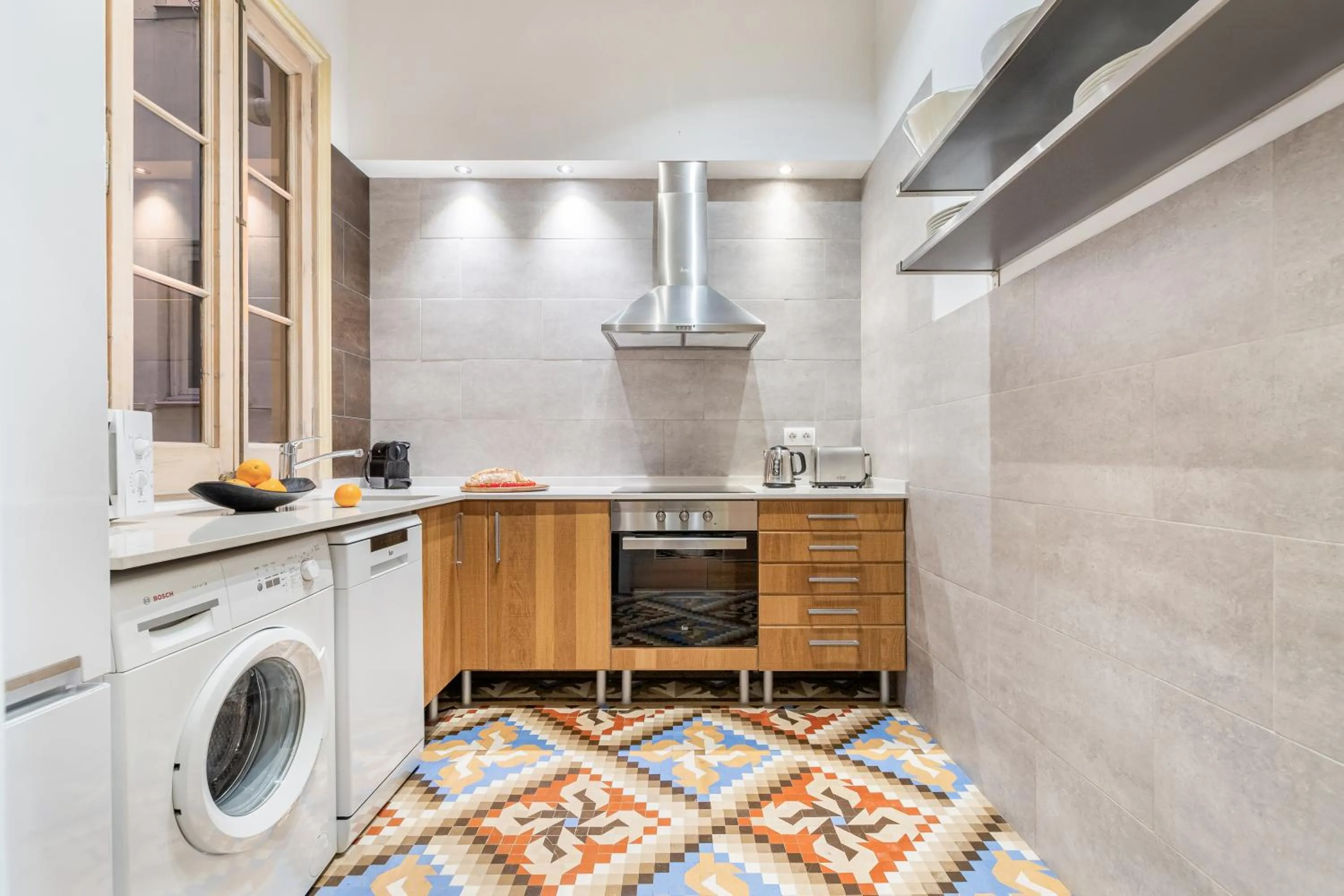 dishwasher in Fuster Apartments by Aspasios