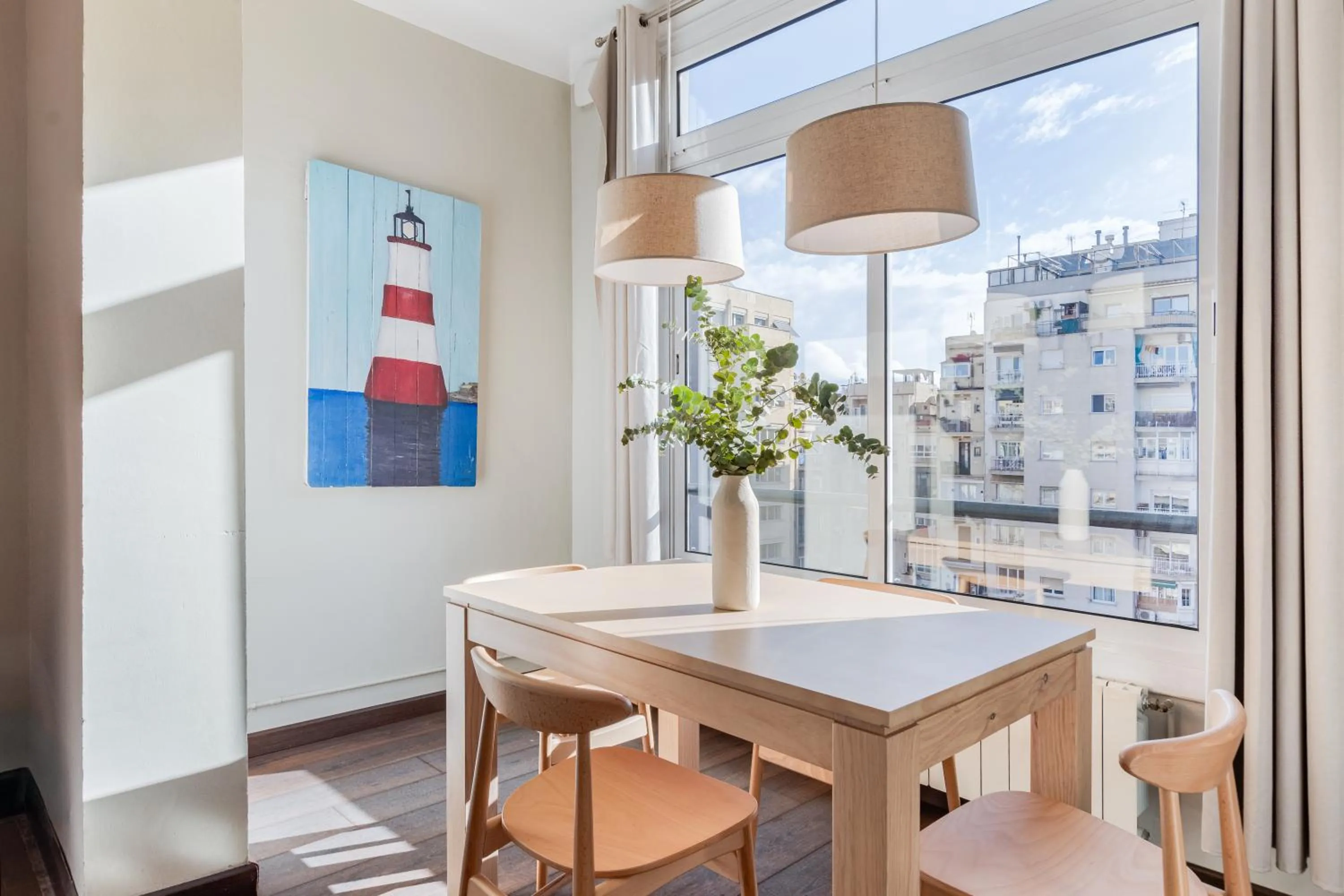 Dining area in Fuster Apartments by Aspasios