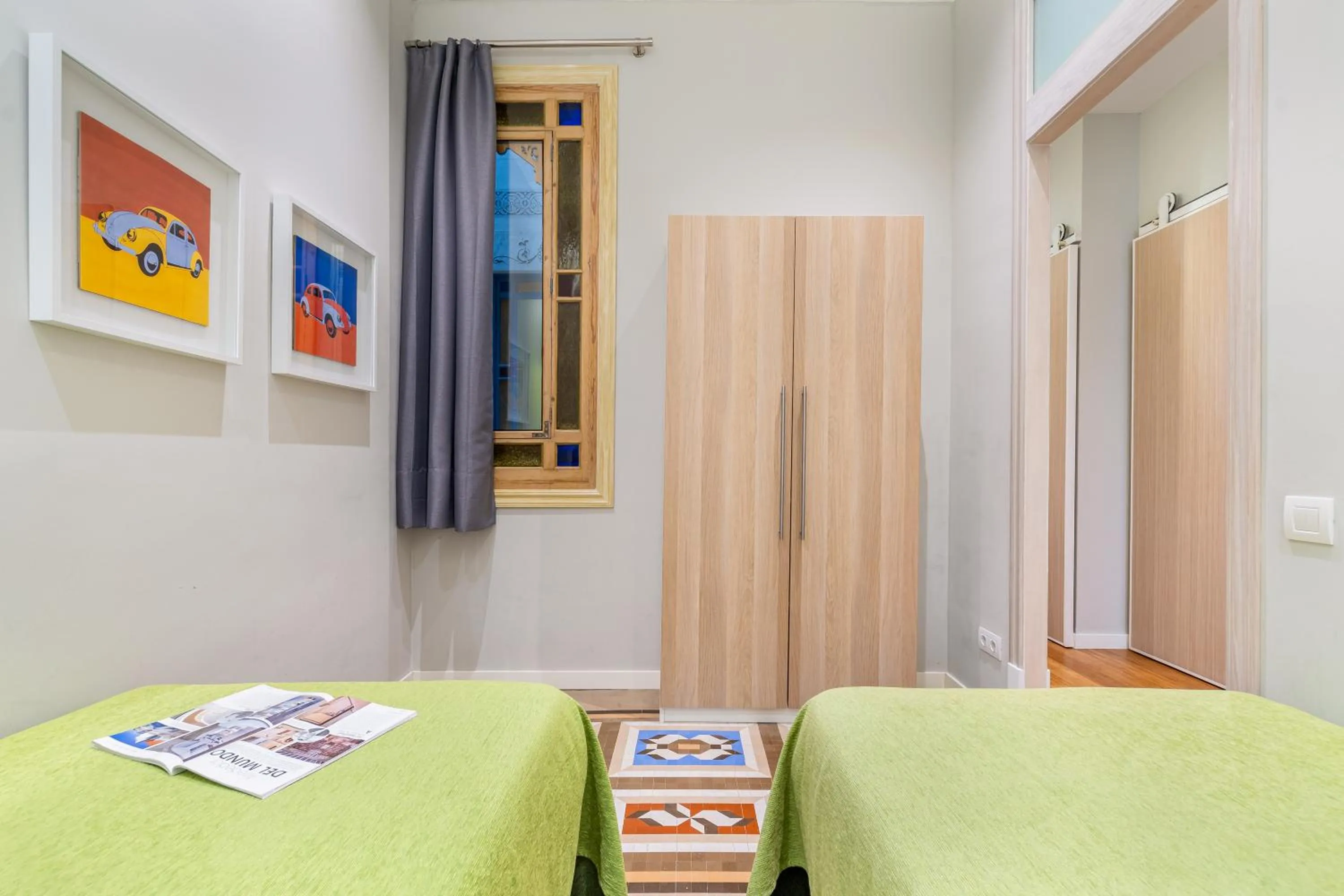 Bed in Fuster Apartments by Aspasios