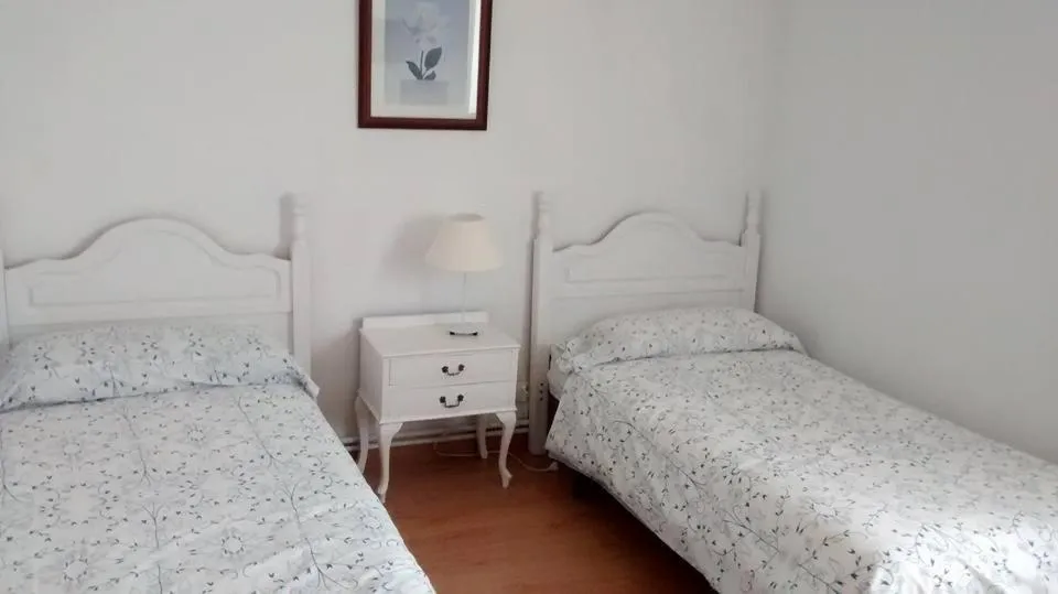 Property building, Bed in Pension Santa Rita