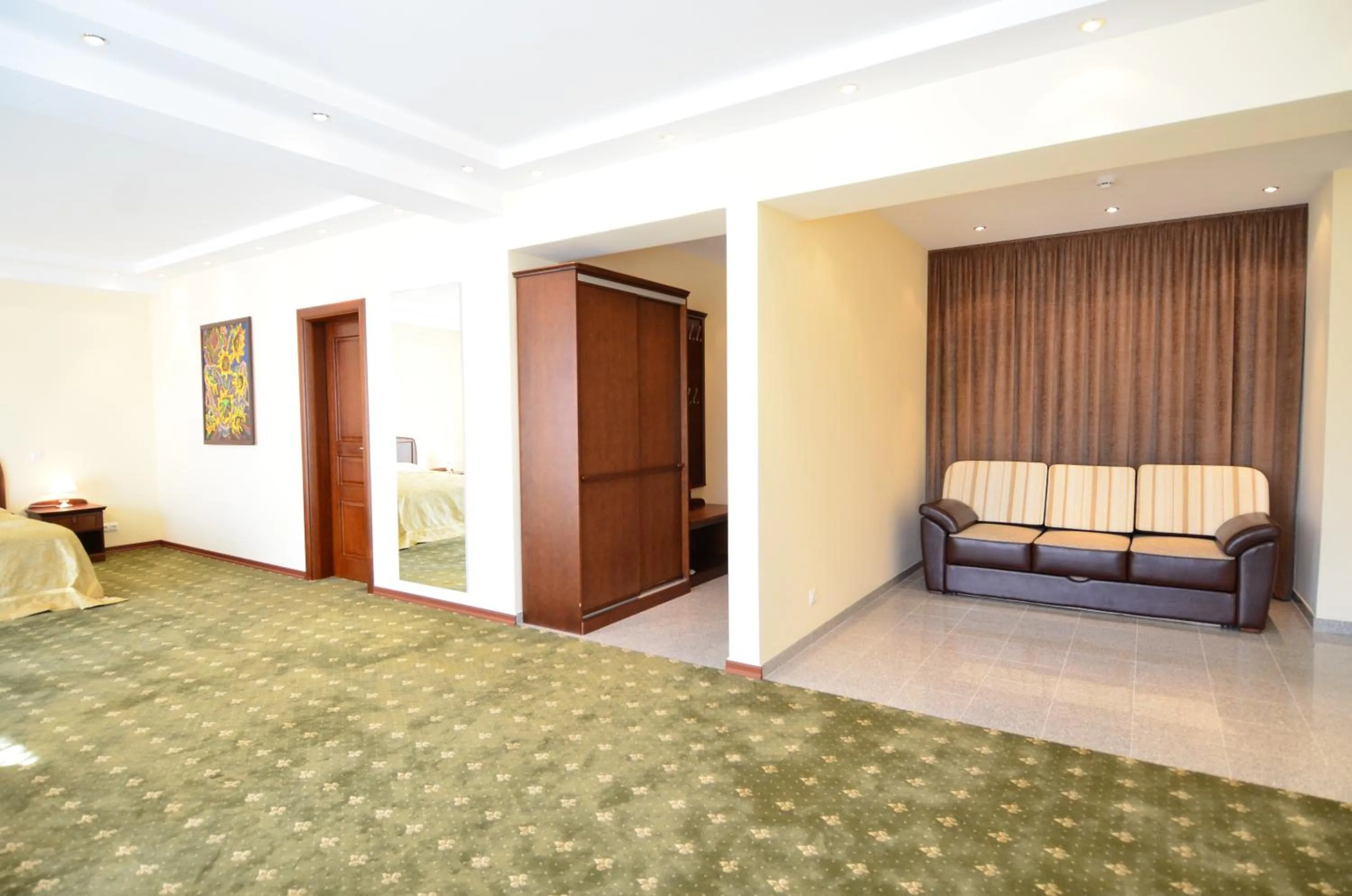 Seating area, Bed in Platinum Hotel