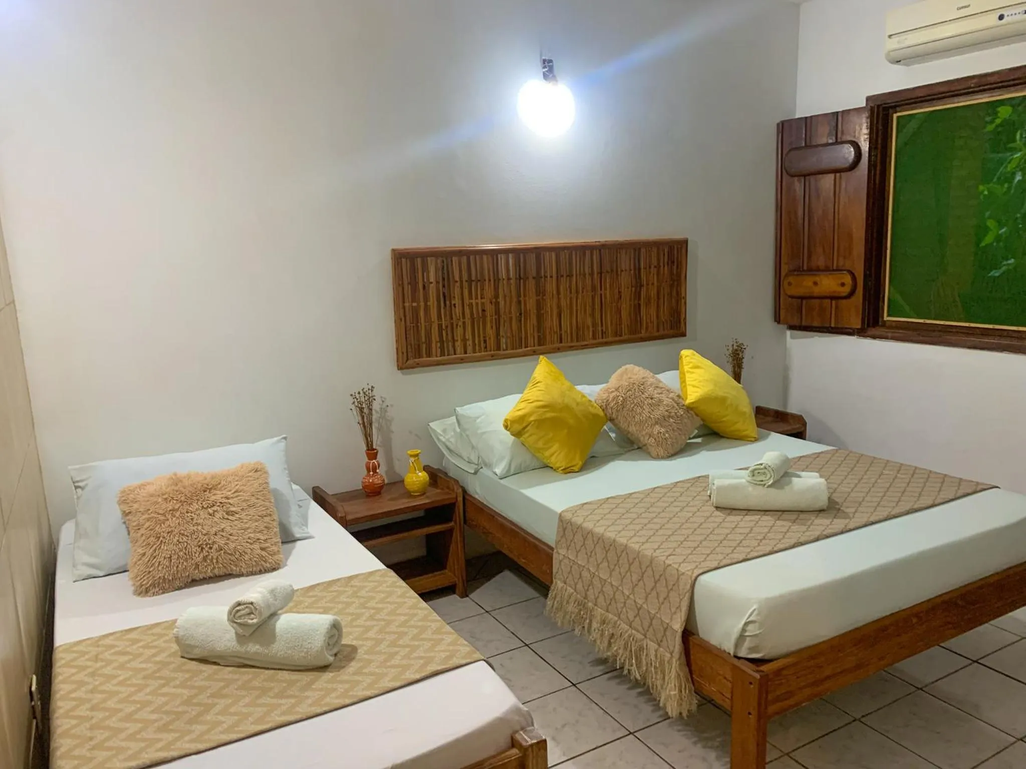 Bed in Pousada Lanai