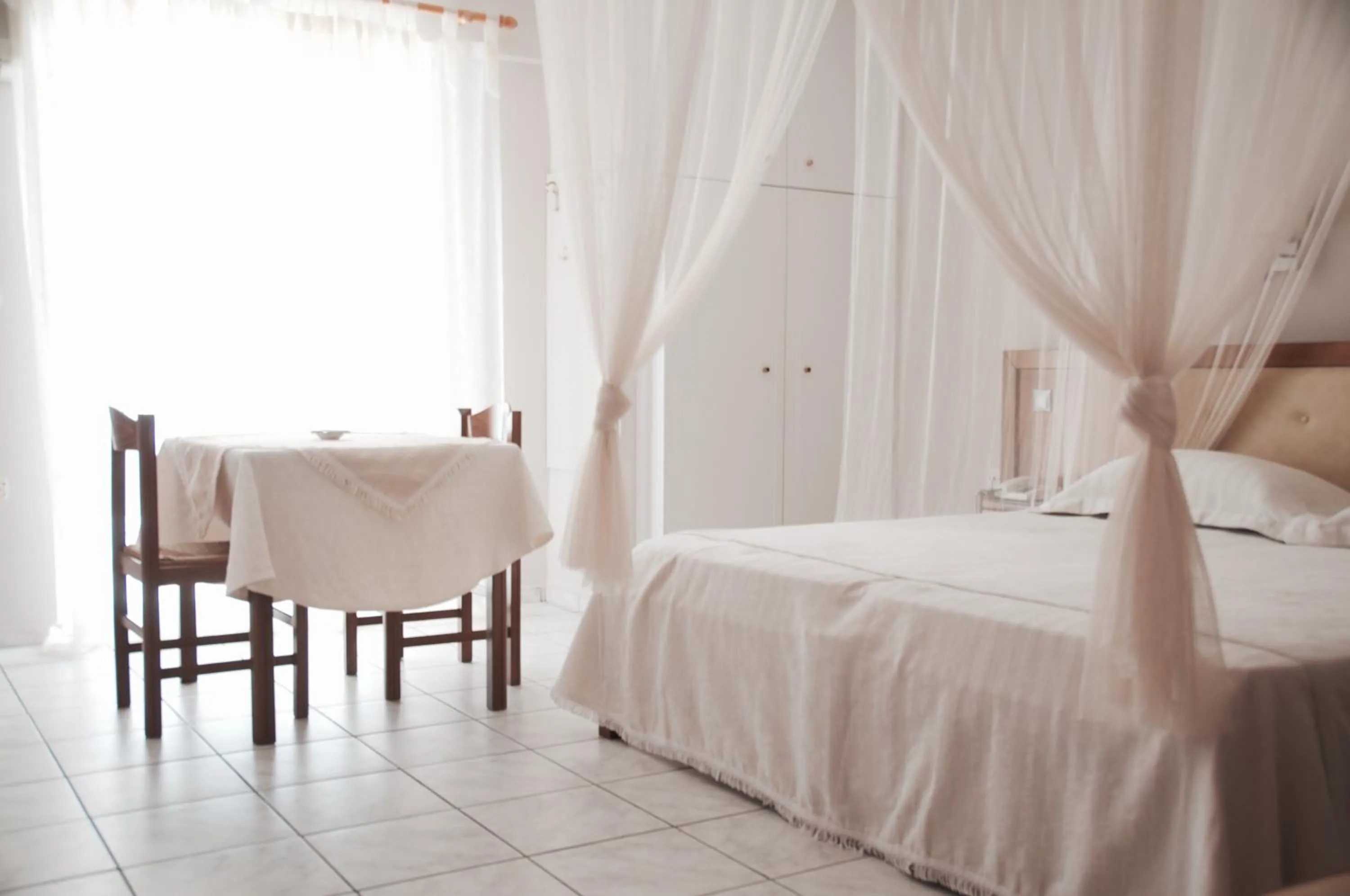 Bed in Calypso Beach Hotel