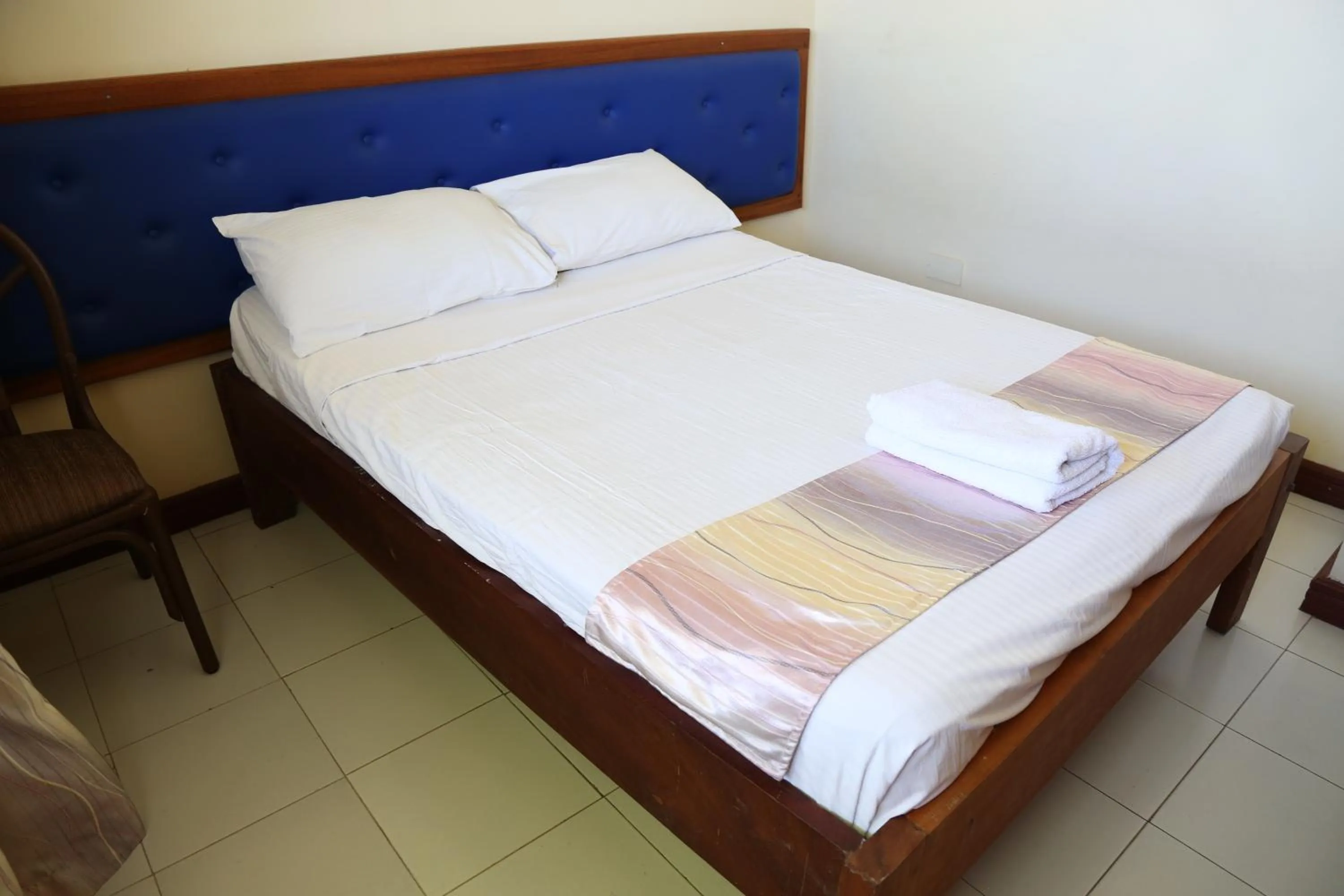 Bed in Prestige Leisure Hotel