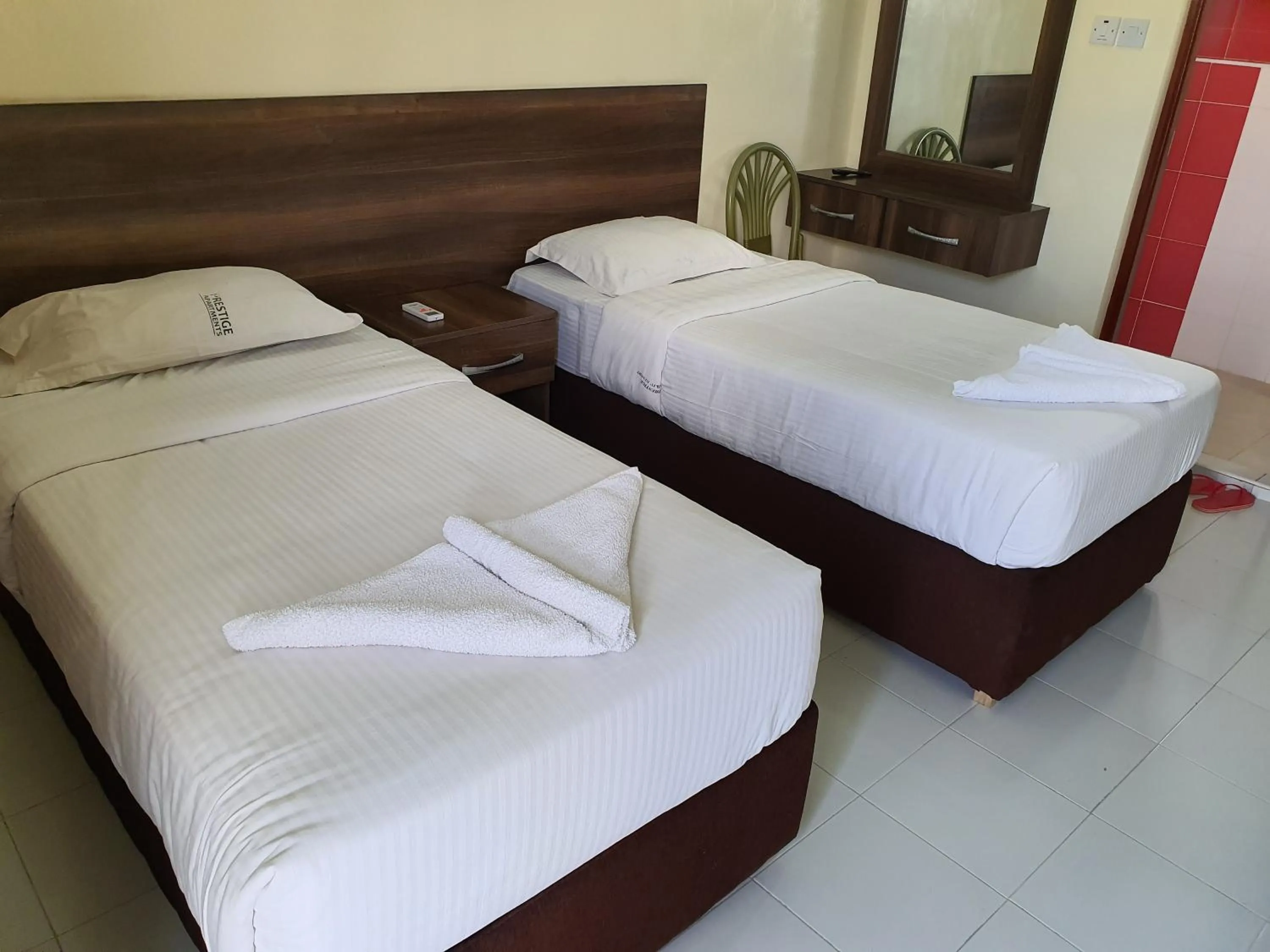 Bed in Prestige Leisure Hotel