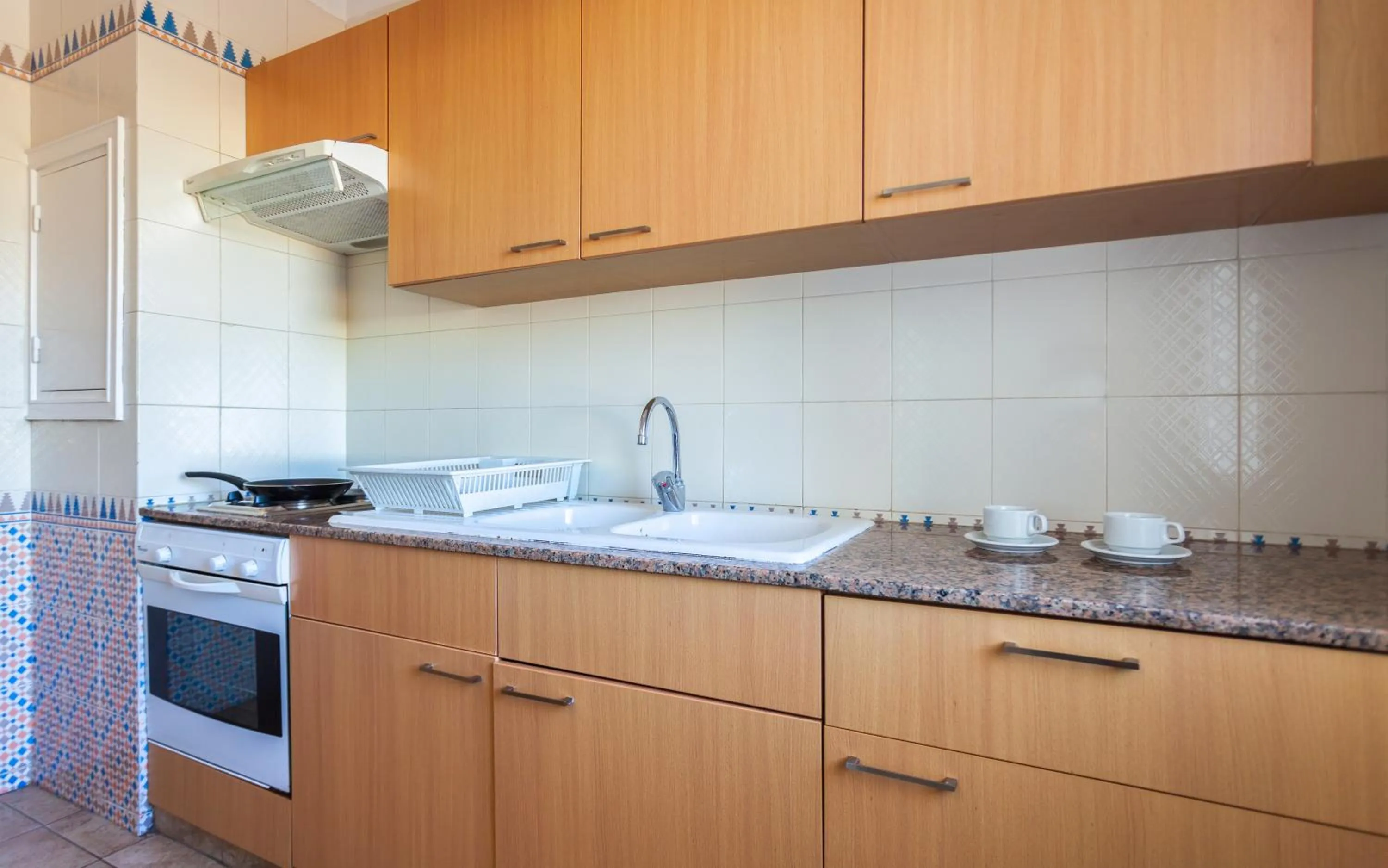 Kitchen or kitchenette in Le Corail Apart'Hotel & Splash Park
