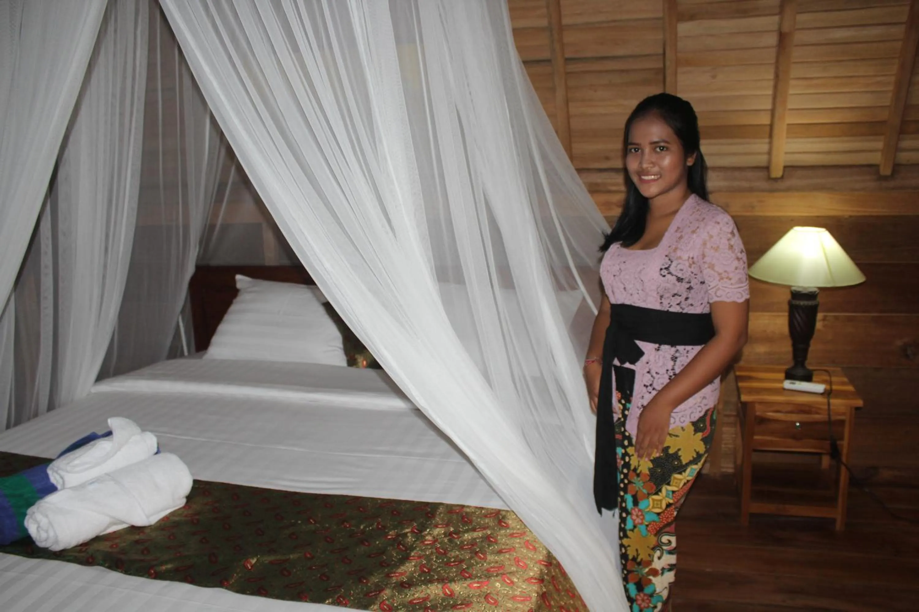 Bed in Halumba Eco Villa Bali