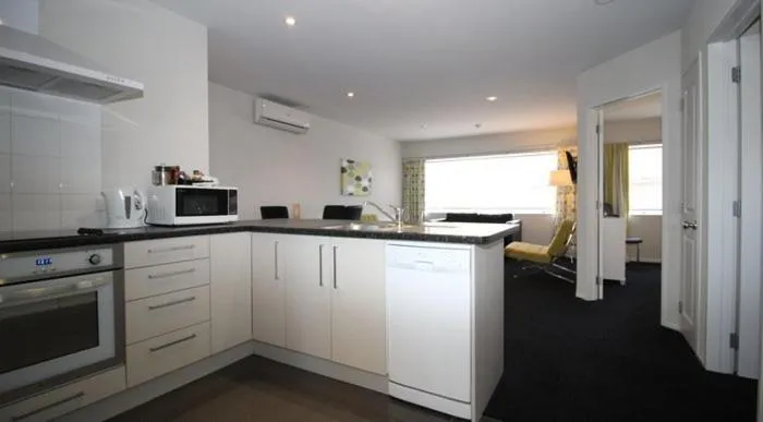 Kitchen or kitchenette in Carramar Motor Inn