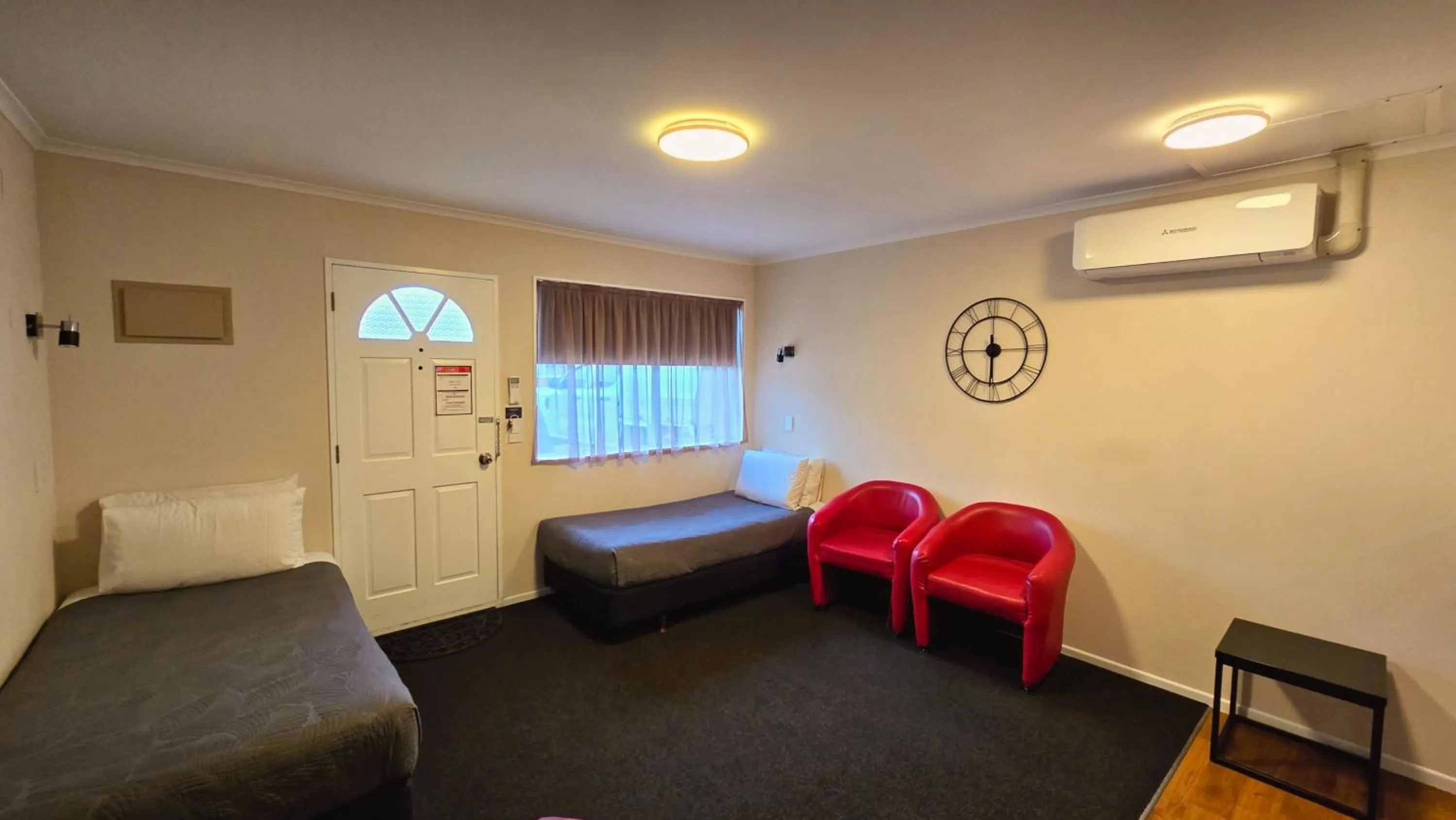 Bed in Carramar Motor Inn