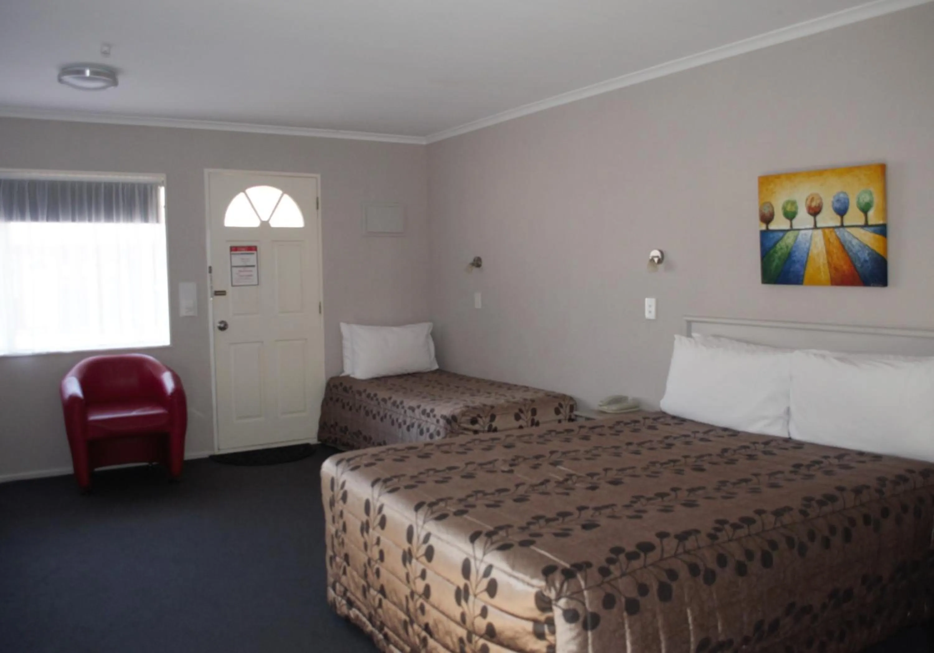 Bed in Carramar Motor Inn