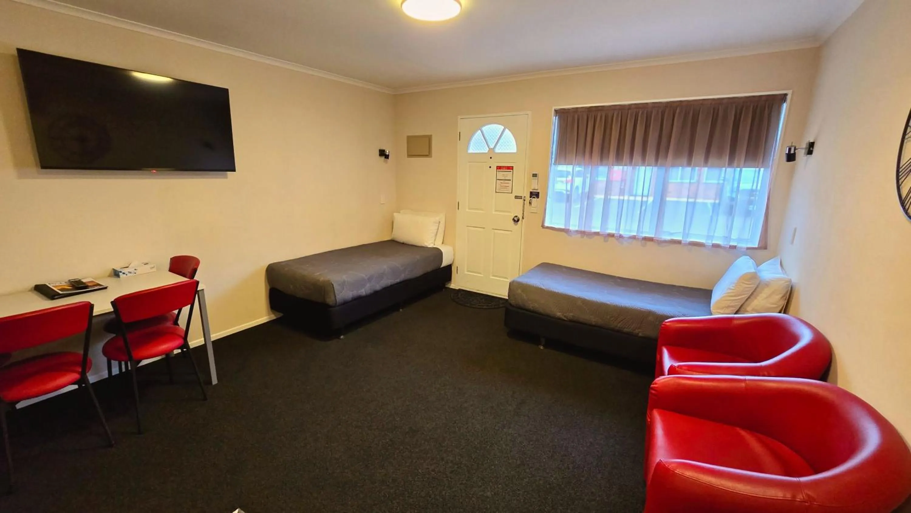 Bed in Carramar Motor Inn