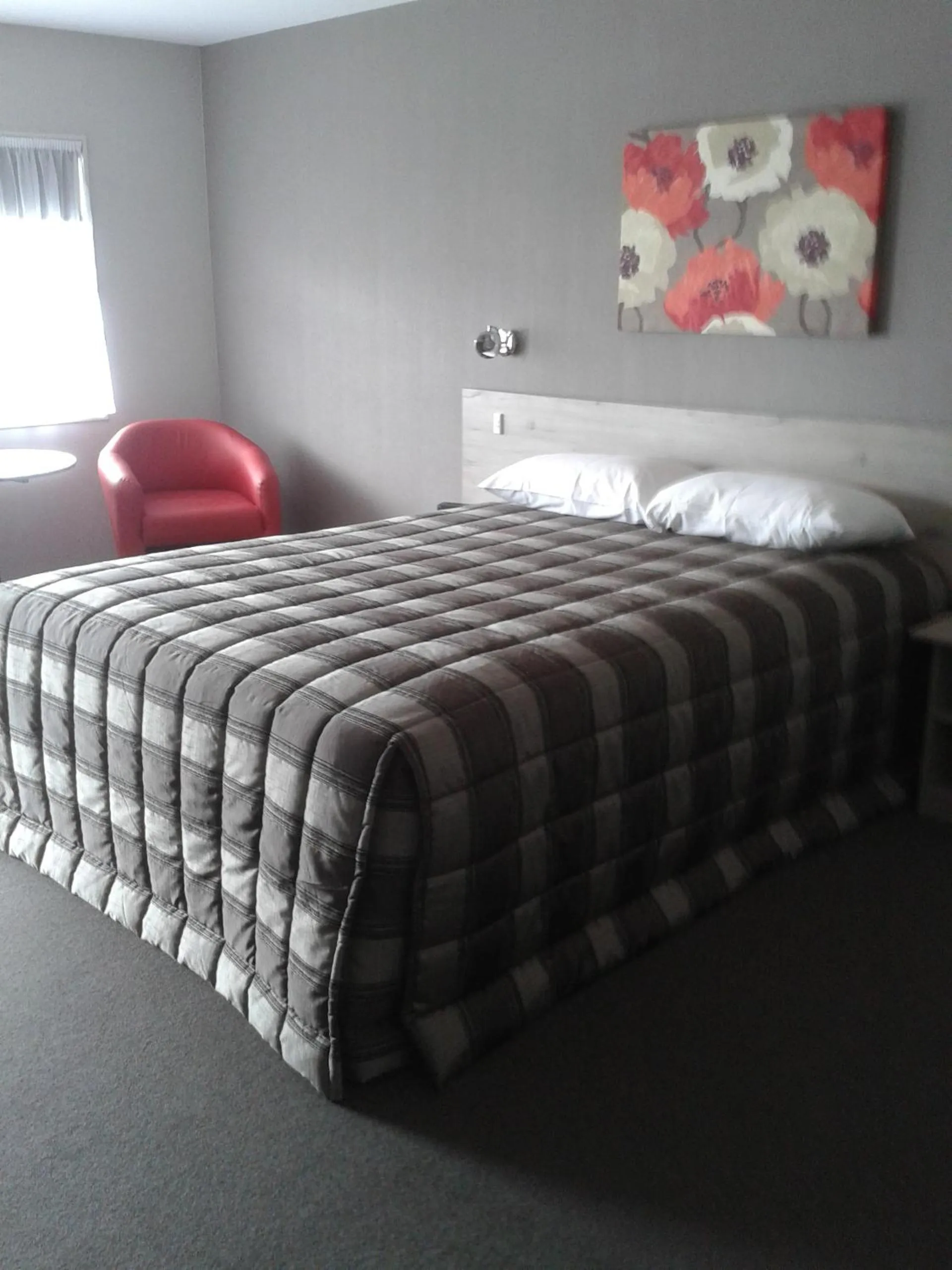 Bed in Carramar Motor Inn