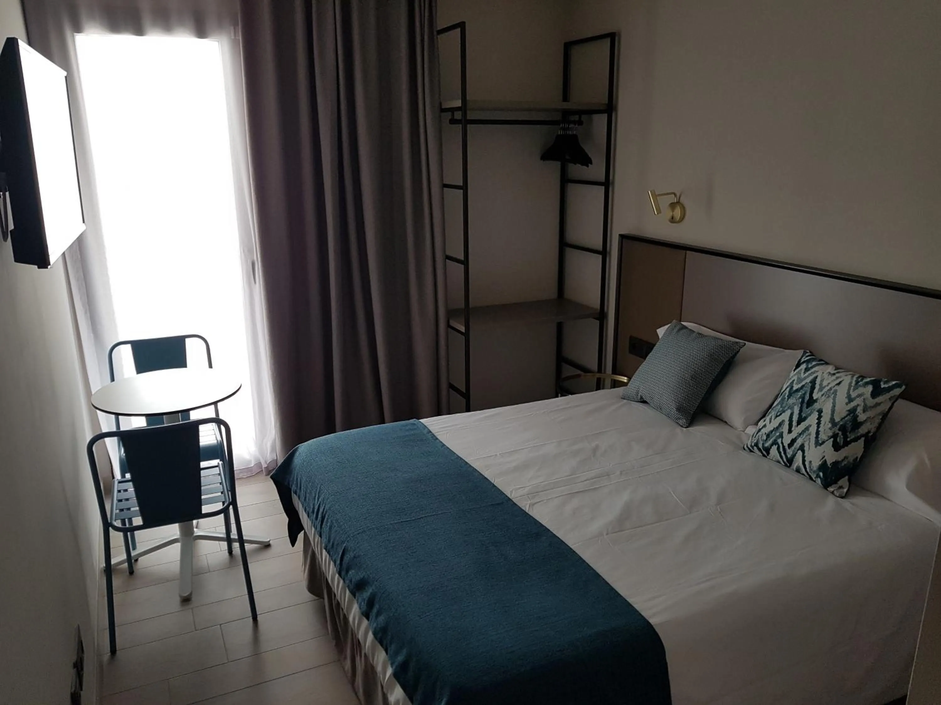 Bed in HOTEL TORRENT