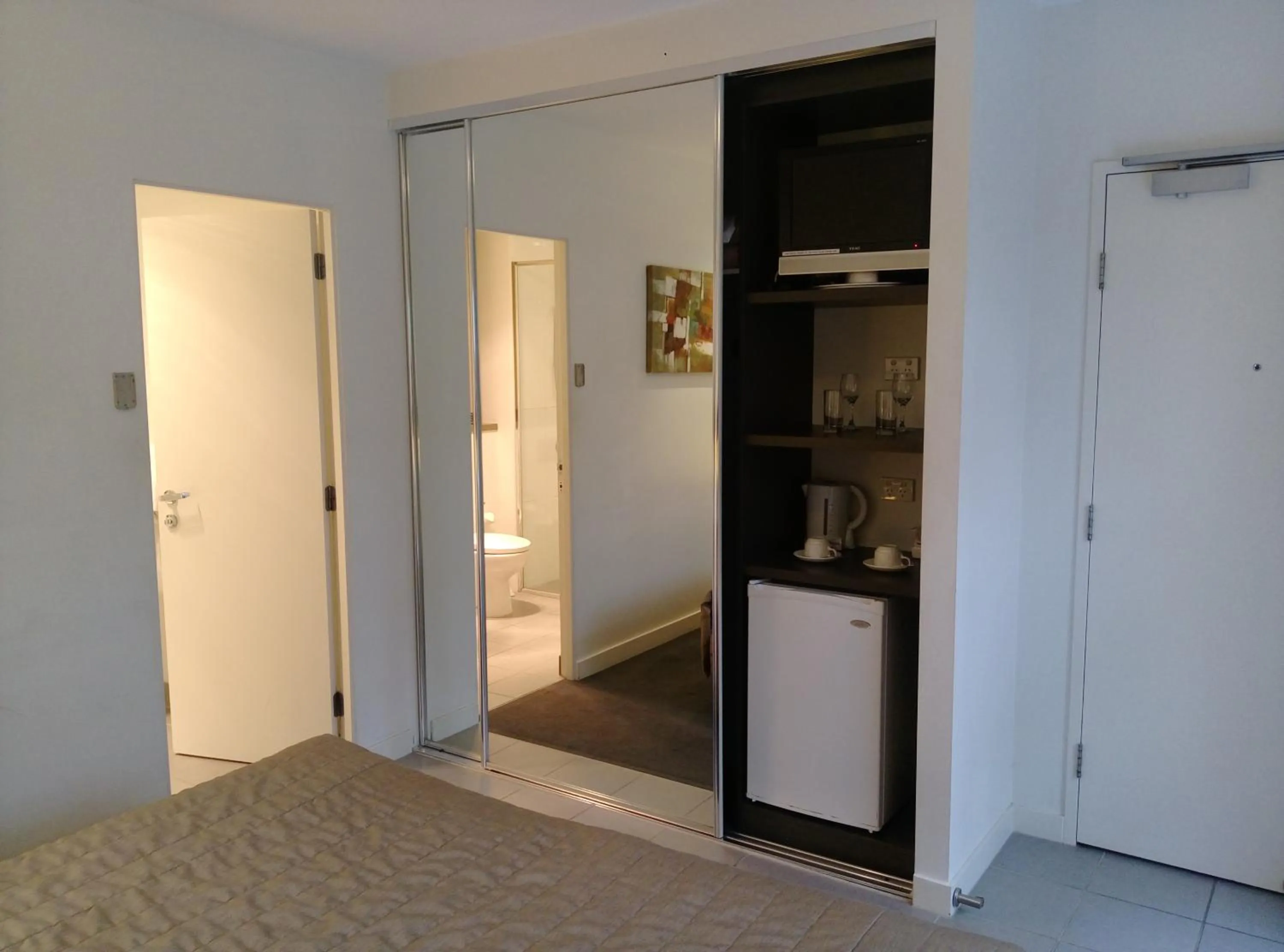 Bathroom, Bed in St Kilda Central Apartments