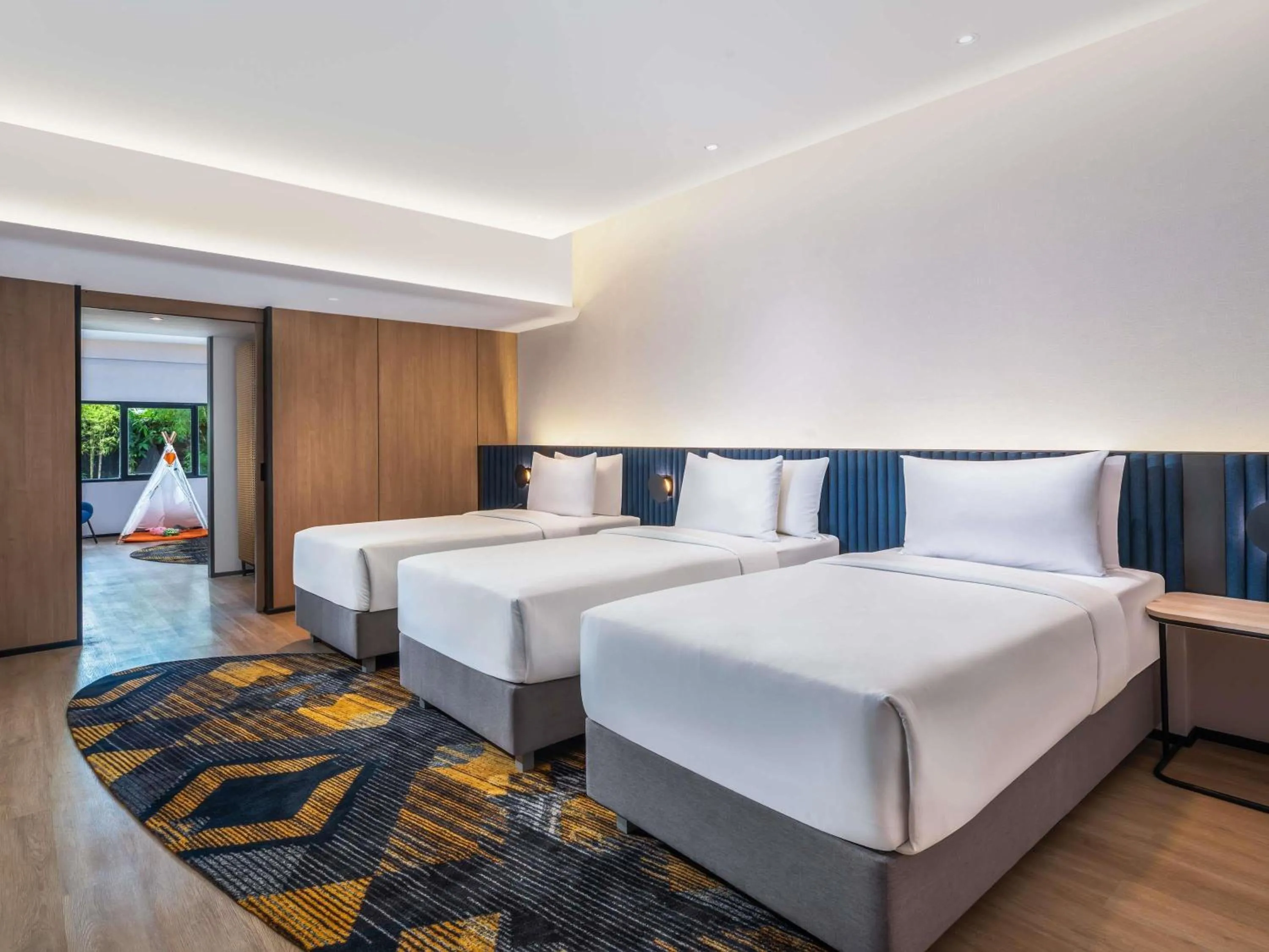 Family Room with Three Single Beds in Novotel Pontianak Convention Centre