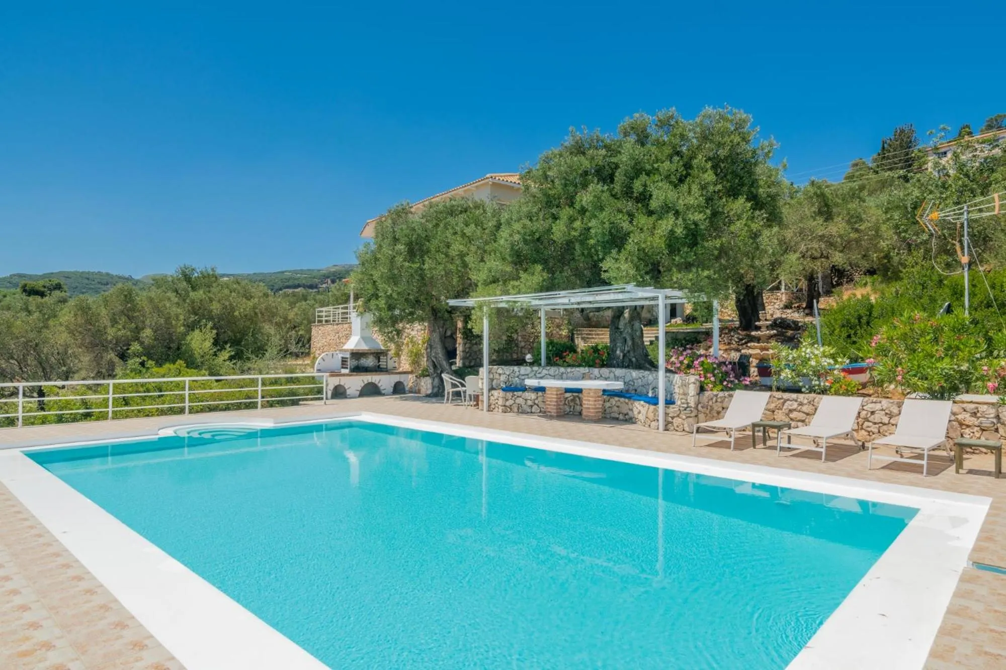 Swimming pool in Armyra Villas - Apartments with Sea Views & Shared Pool