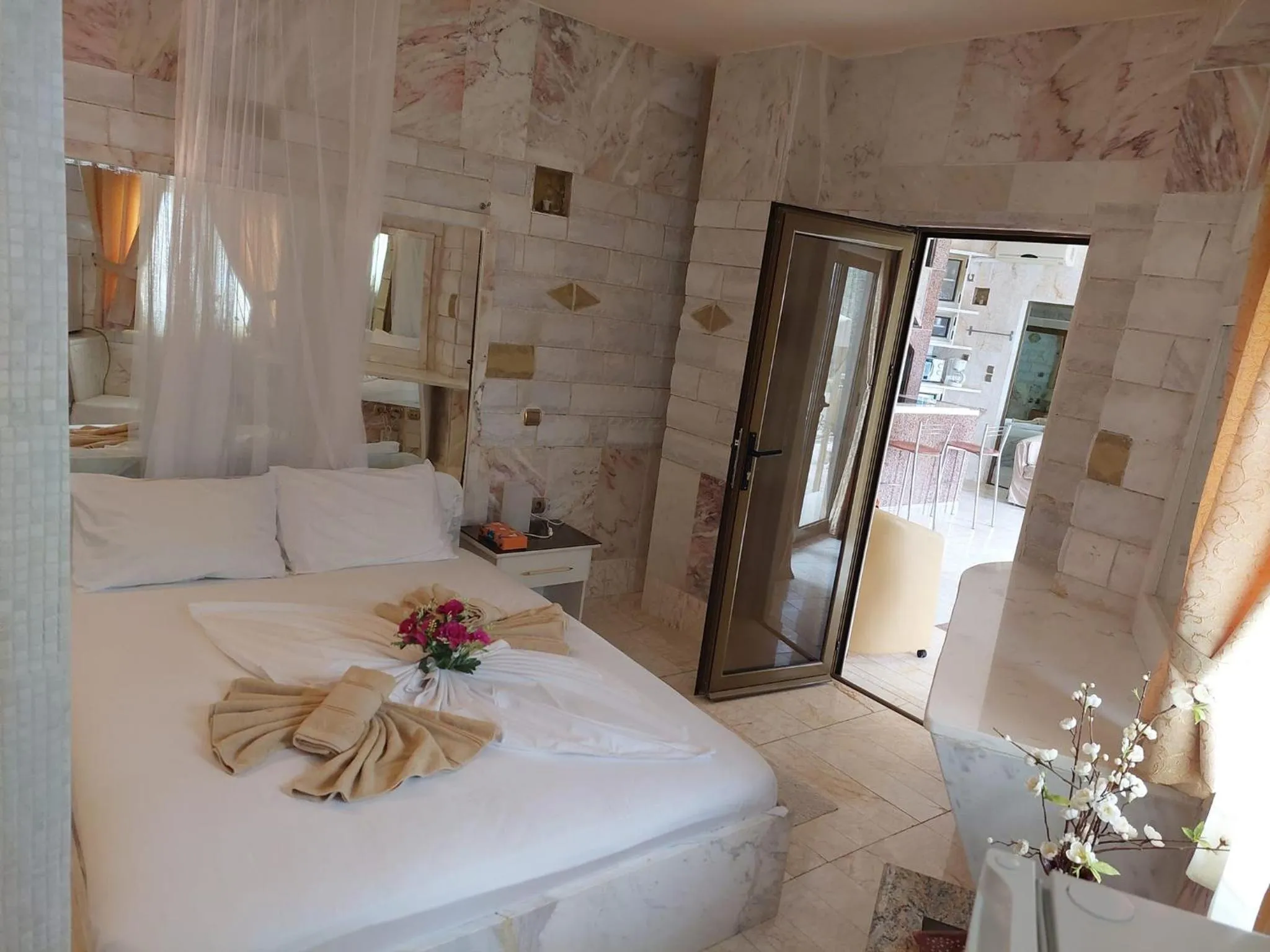 Bed in Paco's Resort Holiday Flats