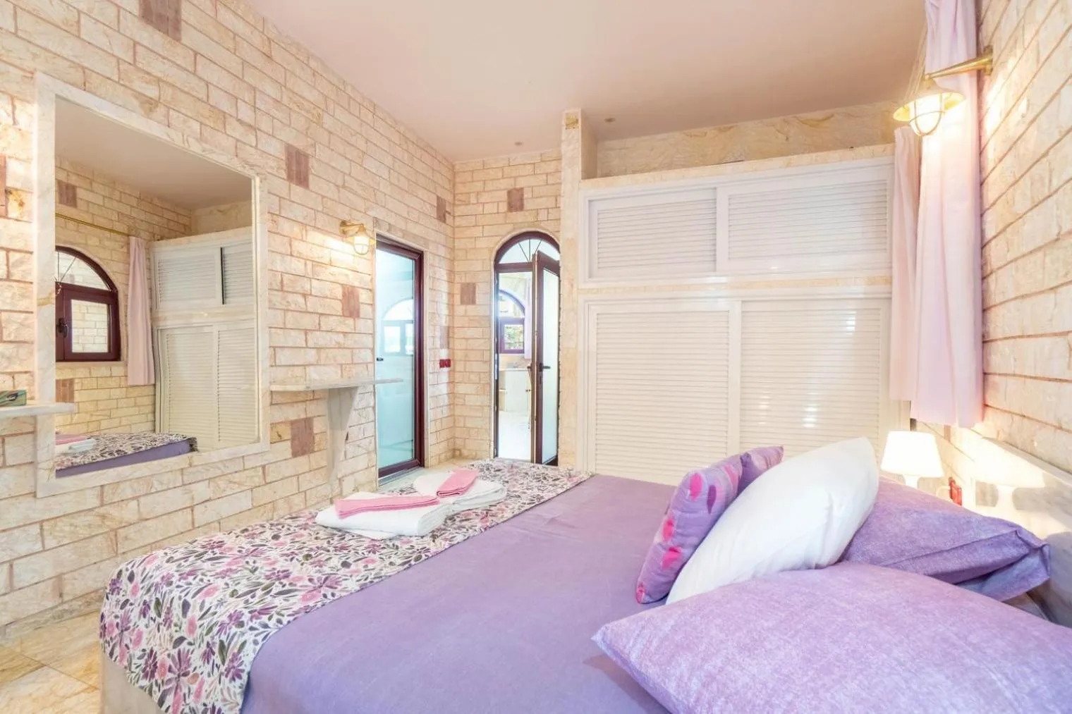 Bed in Paco's Resort Holiday Flats