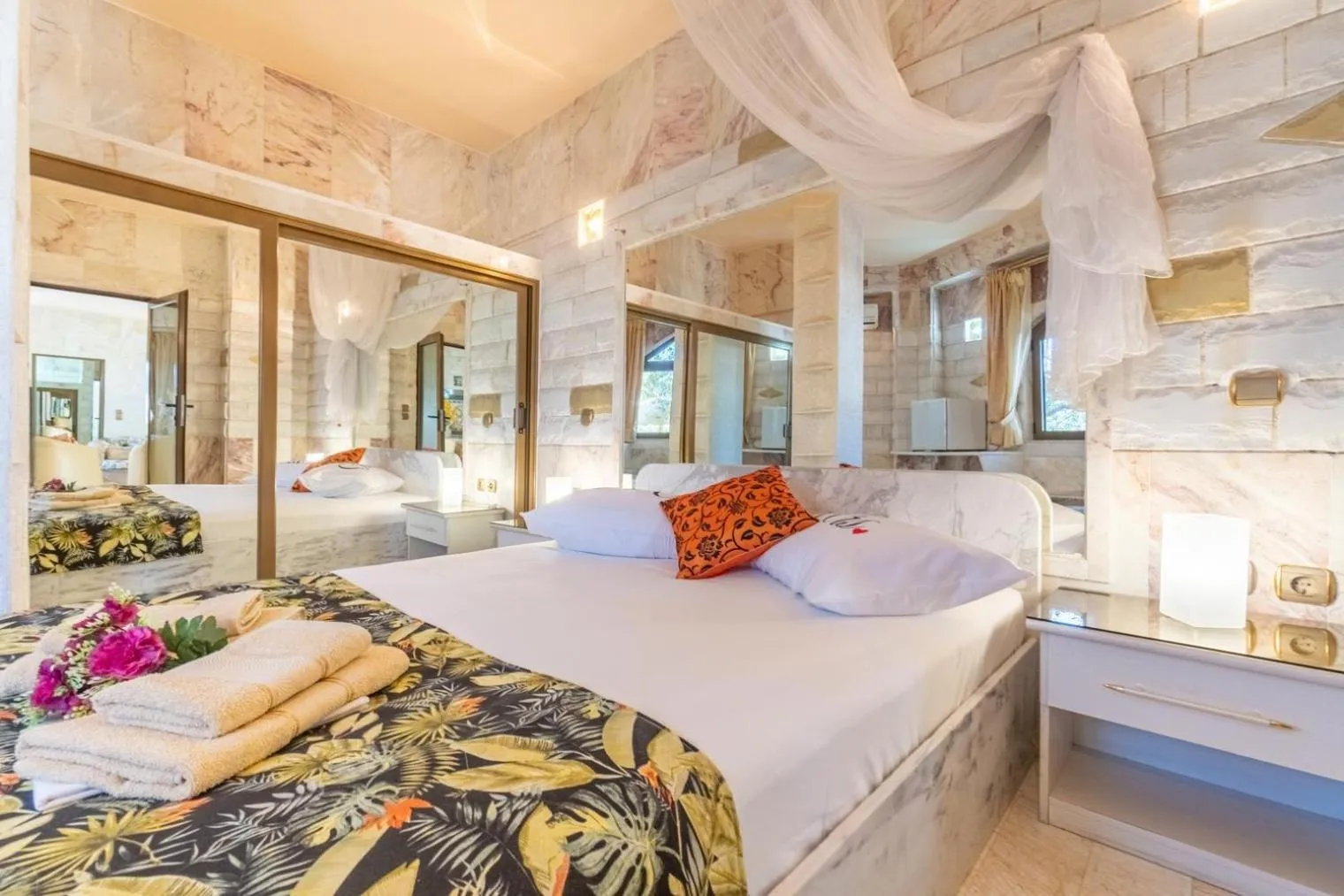 Bed in Paco's Resort Holiday Flats