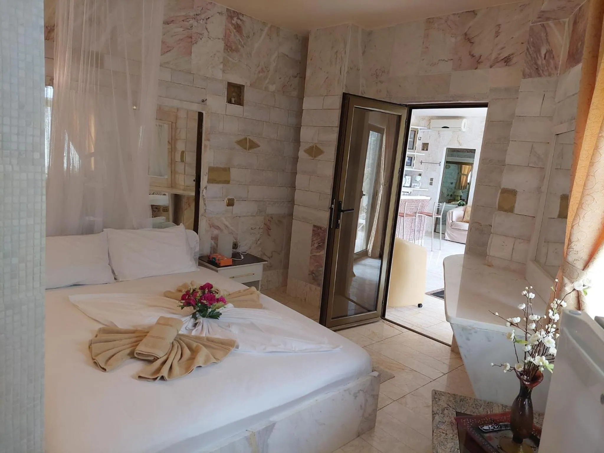 Bed in Paco's Resort Holiday Flats