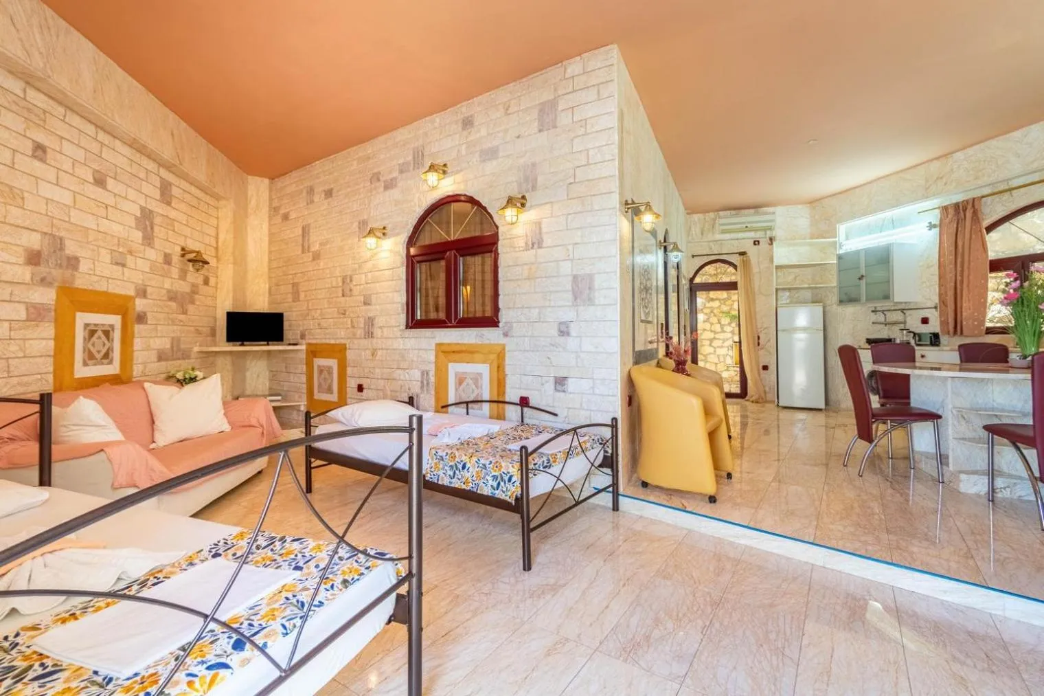 Bed in Paco's Resort Holiday Flats