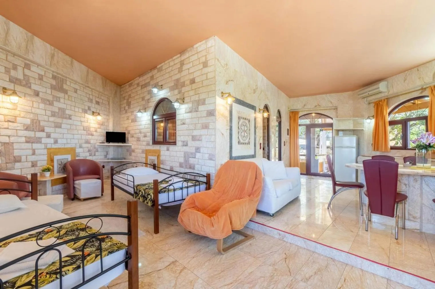 Bed in Paco's Resort Holiday Flats