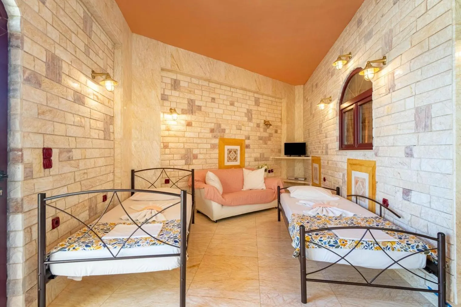 Bed in Paco's Resort Holiday Flats